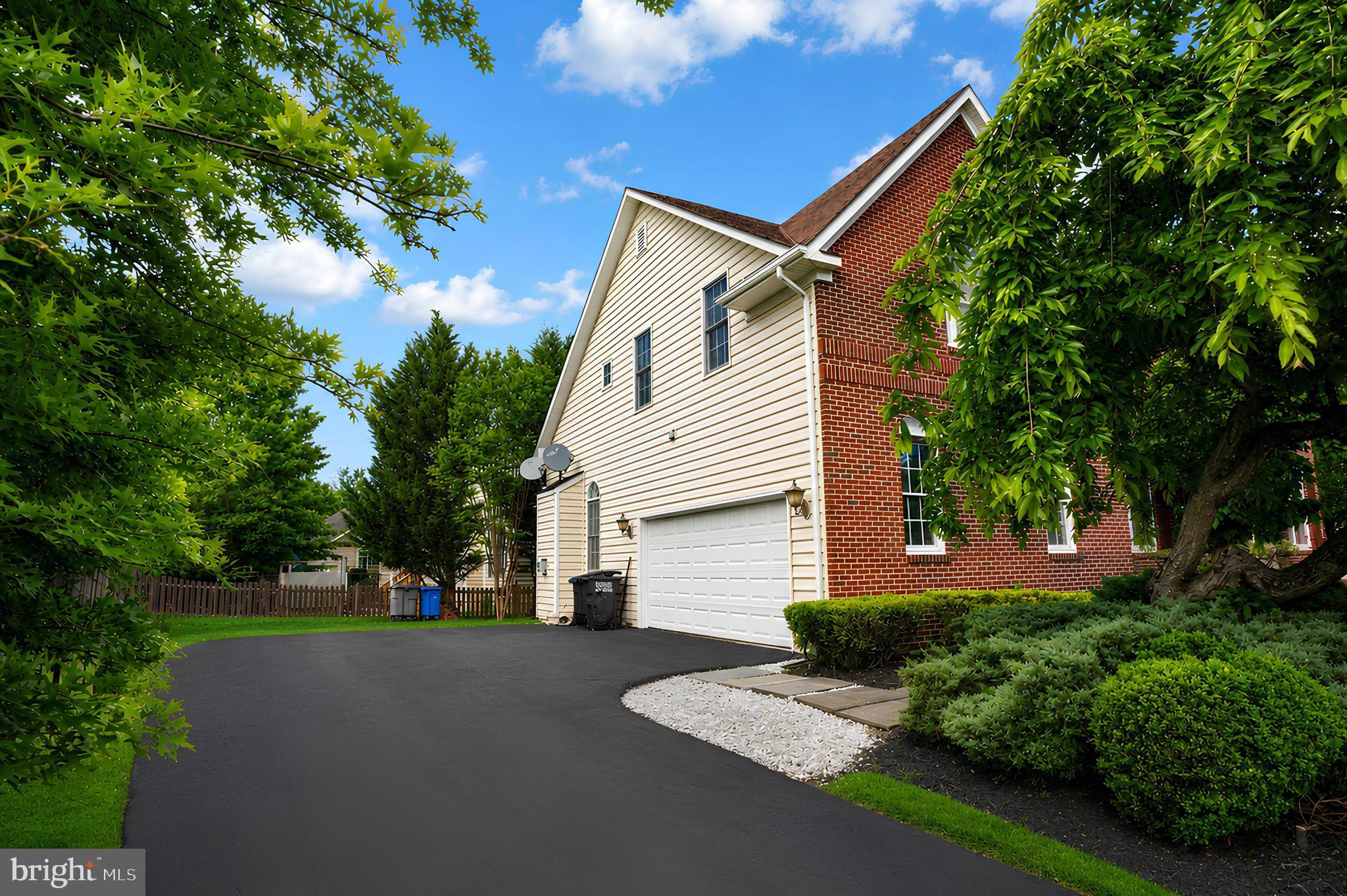This outstanding home features an open floor plan with two-story foyer and family room. 4,200 square feet of luxury living on 3 levels.   Large gourmet kitchen with upgraded cabinets, granite counters, and stainless appliances. Freshly painted with impressive hardwood floors throughout. Oversized side-load two-car garage. Lower Level also includes a walk-out areaway and substantial storage . Upper level features a generous primary suite with two walk-in closets and primary bath with dual sinks and soaking tub. Three additional oversized bedrooms and two newly updated baths complete the upper level. Work at home with two offices located on the main and lower level.