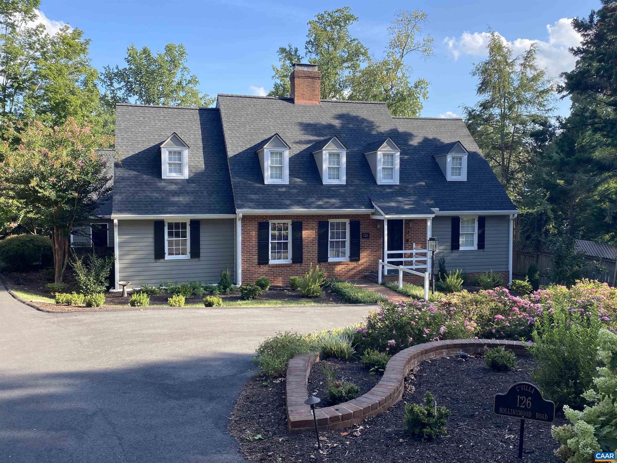Set on a generous one-third?acre lot in the heart of the University of Virginia, this recently renovated and substantially improved Cape Cod home is truly move-in ready. Enjoy an easy walk to the Rotunda and UVA?s stadiums, or take advantage of miles of nearby trails for hiking, biking, and running. The welcoming living room features a gas fireplace, rich paneling, and custom built-in bookcases, while the charming dining room easily accommodates large gatherings. The inviting kitchen, appointed with Carrara marble countertops and wood floors, opens to a light-filled family room with a wood-burning fireplace, wine and coffee bar, and abundant natural light throughout the day. The main-level primary suite offers a walk-in closet plus an office or second walk-in closet. The spa-like primary bathroom includes a spacious tiled shower, soaking tub, heated floors, and dual vanities. Upstairs are two ensuite bedrooms that share a bath, a fourth bedroom, and a third full bathroom. A separate staircase leads to a versatile second-level recreation room, office, playroom, or studio. Additional features include an oversized two-car garage with an extra bay for outdoor equipment. Outdoors, enjoy the expansive deck, fire pit and fenced yard.,Marble Counter,Wood Cabinets,Fireplace in Family Room,Fireplace in Living Room