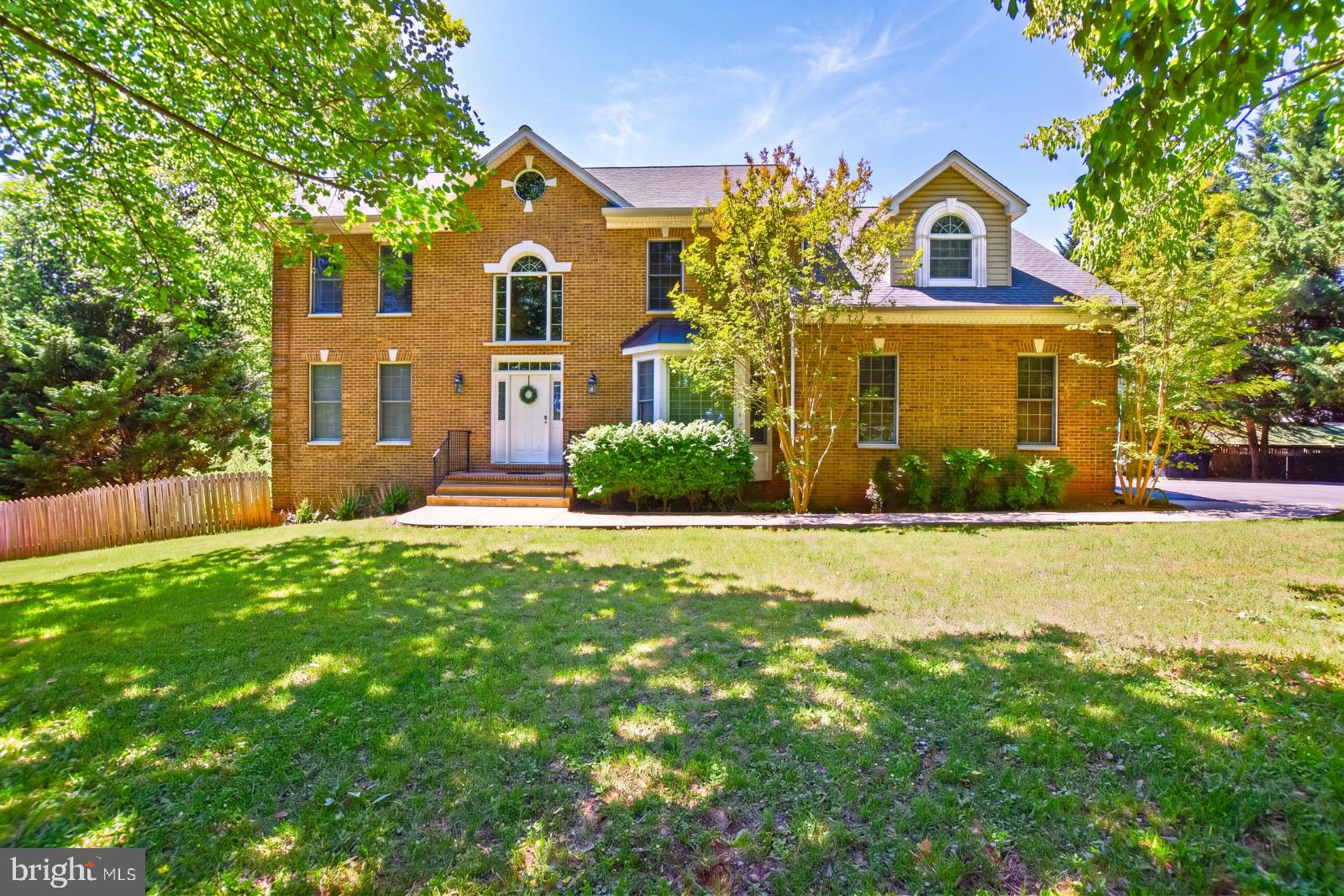Prepare to be WOWED by all that this colonial style house has to offer. Perfectly situated within highly sought after Crescent Hills Estates is this 4-bed, 4.5-bath home, gracefully set on 1.32 acres. A grand two-story foyer with a catwalk welcomes you into bright, open living spaces, including a formal living room and an elegant dining room ideal for entertaining. Conveniently located off of the family room is the eat-in kitchen which serves as the heart of the home, offering a comfortable gathering space for everyday living. On the main level you will also find a dedicated private office, enhanced with custom built-in shelving, providing a quiet and functional workspace. The second level is dedicated to all four bedrooms as well as a Jack and Jill bathroom and two additional full bathrooms. The spacious primary suite is a true retreat highlighted by vaulted ceilings, hardwood flooring a luxurious ensuite bathroom with a large soaking tub, a beautifully tiled walk-in shower, and a double vanity. If that isn't enough to want to call this place home, it also features a full walkout basement. The basement offers exceptional potential for recreational space with direct access to a patio and fully fenced backyard. This home offers a rare combination of space and privacy in a well-established neighborhood where mature trees and landscaped surroundings create a peaceful, inviting atmosphere year-round.