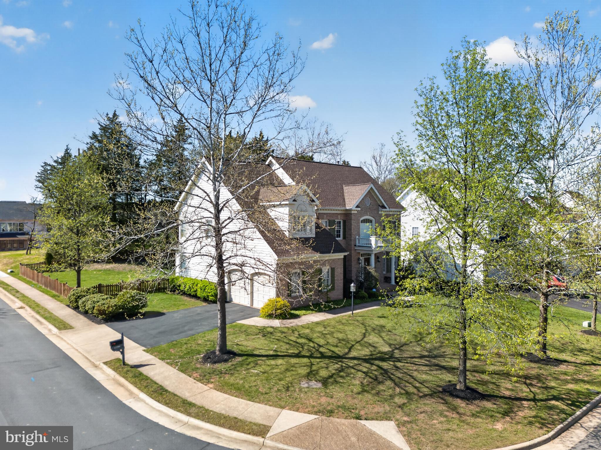 Fantastic Price improvement !!!! Elegance abounds in this beautiful semi -custom home by Robert Jordan homes "Wright Model"
  ******** ASSUMABLE VA LOAN UP TO 430K AT 1.75%  ******  Sweeping curved stair case invites you into this lovingly maintained home with and impressive 20ft wall of windows that line the two story family room! Two sided fireplace, arched entryways 9 and 20 foot ceilings, Incredible  REMODELED eat in kitchen with cherry cabinets, granitle countertops 2 wall ovens PLUS full range and convection microwave.  All newer stainless appliances with stainless undermount sink Insinkerator disposal and hot water dispenser.    Opens onto HUGE  (18x16) sunroom addition with octagional wall of windows and transomes, tile flooring leads to  a charming deck that lines rear of home, Fully fenced corner lot back to treed common ground.  Newly remodled main level bath boasts marbel flooring, lighting ,fixtures, toilet and vanity, Main level home office  Plantation, custom and wood blinds through out. Rear staircase off second story cat walk brings you into the kitchen with the convenience of main level laundry .   Light filled second level with master bedroom with tray ceiling his and her closets. Ample luxury master bath with 12x12 ceramic tile floors , dual vanities and soaking tub 2nd bedroom with private bath, 3 &4 bedroom share larger bath with dual vanites.  Designer custom paint through out the home with 2000sf unfinished basement...New and newer  2025 3 8x4 windows  Both HVAC systems 2015, 2022 Roof and gutters 2022 window screens 2022    sump pump 2021 hotwater heater 2021