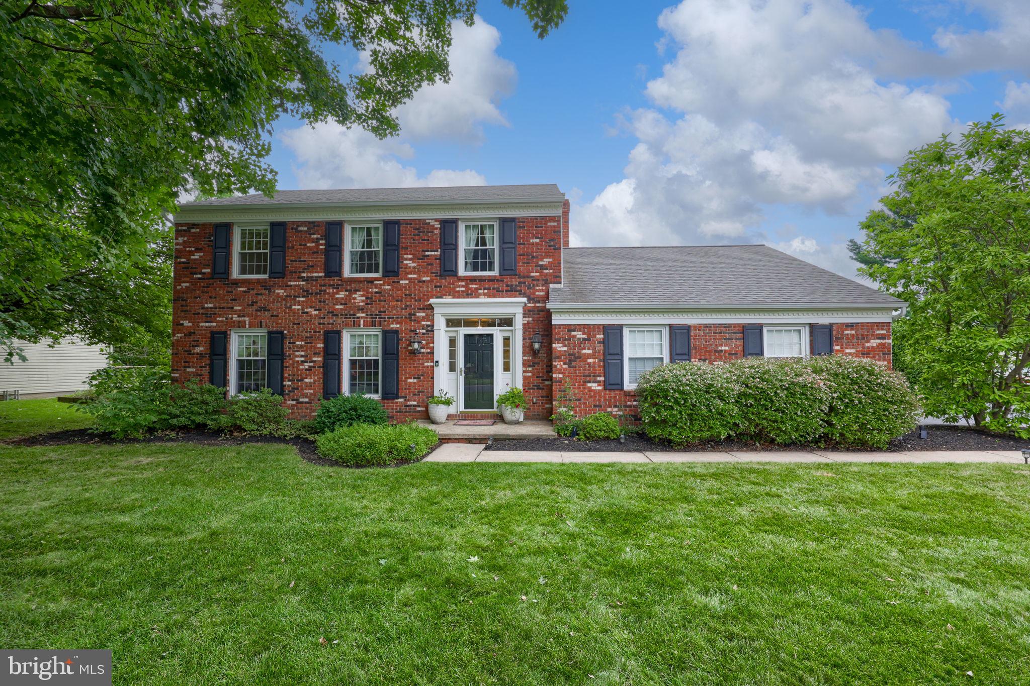 1856 Beverly Drive – Impeccably Maintained Brick Colonial in Desirable Beverly Estates! Welcome to this stunning solid brick colonial, nestled in the heart of Manheim Township School District.  Exceptionally maintained and thoughtfully updated throughout, this 4-bedroom, 2.5-bathroom home is truly move-in ready and waiting for its next owners.  Step inside to discover bright, fresh paint and beautiful hardwood flooring that flows seamlessly through the main living spaces. The inviting family room features a cozy fireplace, perfect for relaxing evenings at home. Upstairs, spacious bedrooms offer comfort and privacy, while the meticulously kept interiors reflect pride of ownership at every turn.  Outside, your private backyard oasis awaits! The massive concrete patio, complete with a large awning, is ideal for outdoor dining and entertaining. Mature privacy hedges and a shade tree frame the rear yard, offering a serene and secluded setting.  Conveniently located with easy access to schools, parks, shopping, fantastic restaurants, and major highways for an easy commute, this home truly has everything you need.