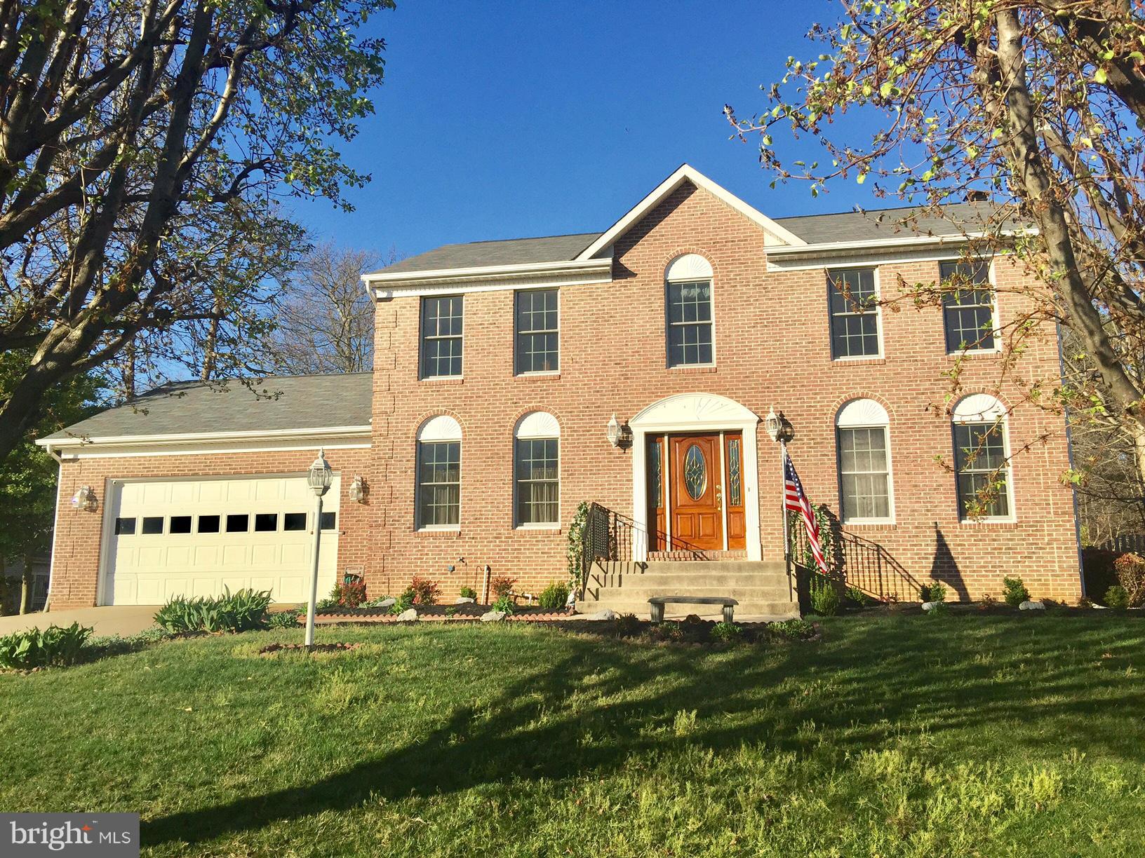 Beautiful Colonial w/ 2 car garage and finished basement. Formal living and dining rooms, eat in kitchen w/ island, family room w/ wood burning fireplace. Master bath w/sep. tub/shower, walk-in closet. Finished basement w/1/2 bath.Large deck leading to in- ground pool, 2 sheds and fenced backyard. Don't miss this one!