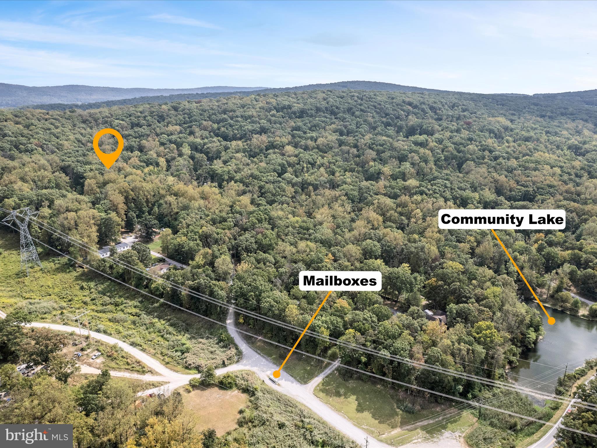 Two adjoining lots that back to a stream being sold together .  Power, water, cable available.  Utility pole already on site.  Tax record indicates on-site septic however no health department records have been obtained.  Buyer to perform all due diligence.  Lots sit at the bottom of the subdivision not far from Chestnut Hill Rd.
