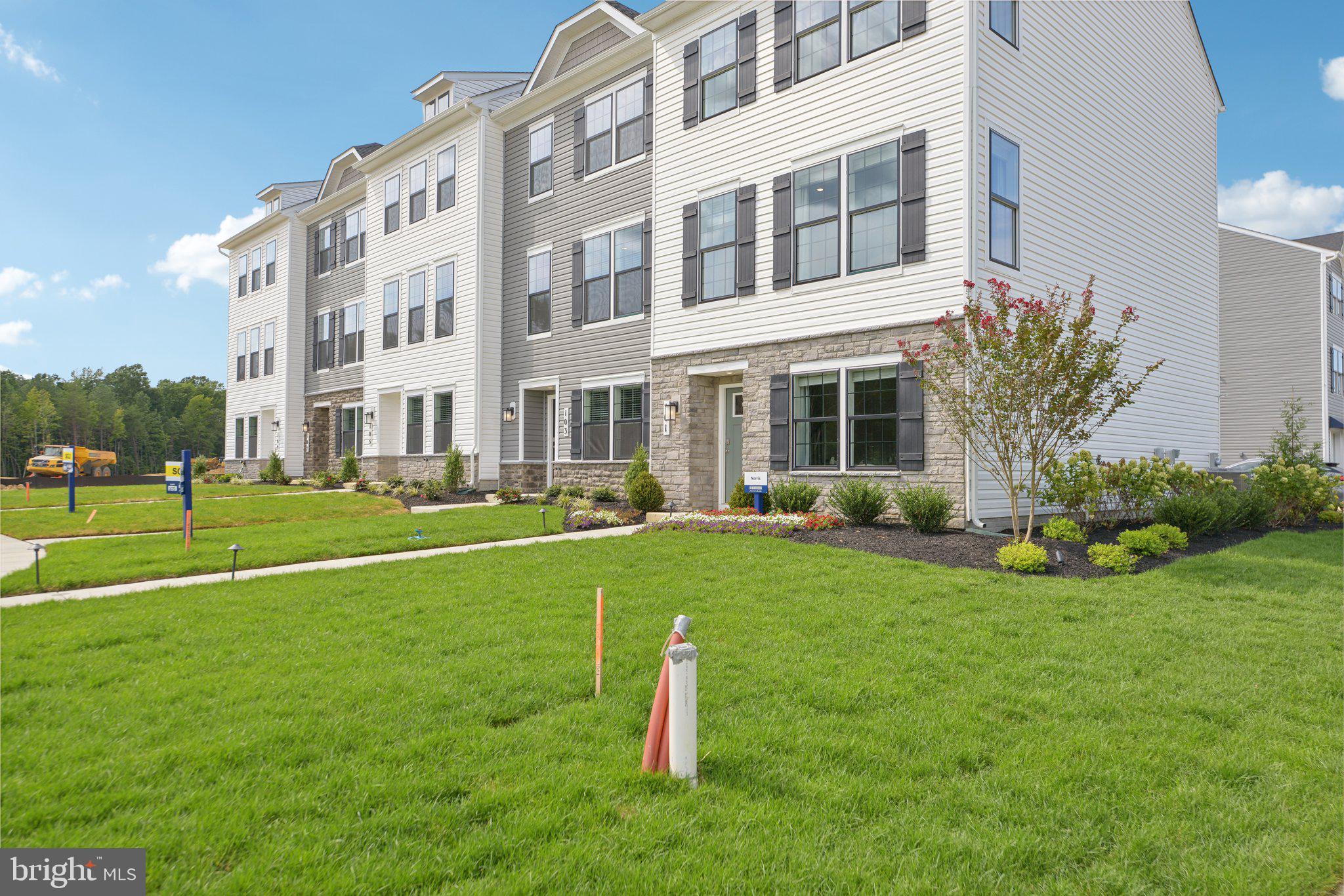 Discover the elegance of the Norris, a stunning townhome offering the latest in smart home technology by Dr. Horton. Spread across three beautifully designed levels, this home features an expansive deck, a modern and open floorplan with 3 bedrooms, 2.5 baths, and a 2-car rear garage, all meticulously laid out within 1,763 sq ft.

The main level showcases a bright eat-in kitchen equipped with recessed lighting and a substantial island, ideal for both gourmet cooking and entertaining. Ascend to the upper level to find a convenient laundry closet and a chic primary bedroom with a walk-in closet and dual vanities. The lower level welcomes you with a charming entry foyer and direct access to the 2-car garage.

Embrace the seamless combination of style and utility in the Norris townhome. Take advantage of generous closing assistance when financed with DHI Mortgage.. Experience contemporary living at its finest in this exceptional townhome.