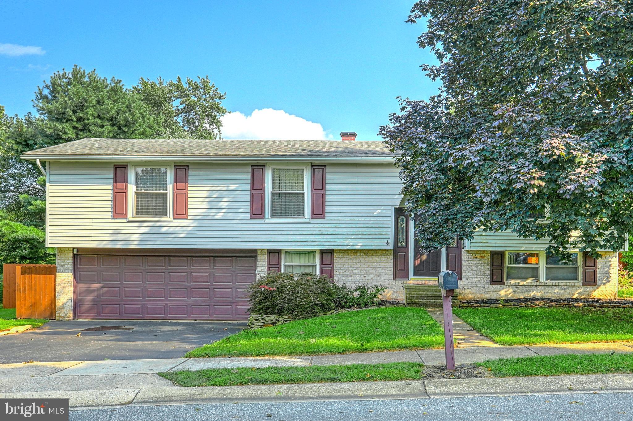 Here it is! The move in ready home you have been searching for with the perfect backyard! Tucked in a quiet neighborhood, you will find this home has been carefully maintained and updated. The huge backyard provides privacy with mature trees, and features a large above ground pool, huge deck, small pond and plenty of space to play! The open layout is perfect for your entertaining. There are three generous bedrooms on main level with a remodeled bath. Downstairs a large rec room, half bath, and fourth bedroom provide the extra space you need. The oversize 2 car garage includes a workbench for your hobbies. All new carpet, paint and updated fixtures make this one easy to call your own. Home Warranty included. Schedule a showing before its gone!