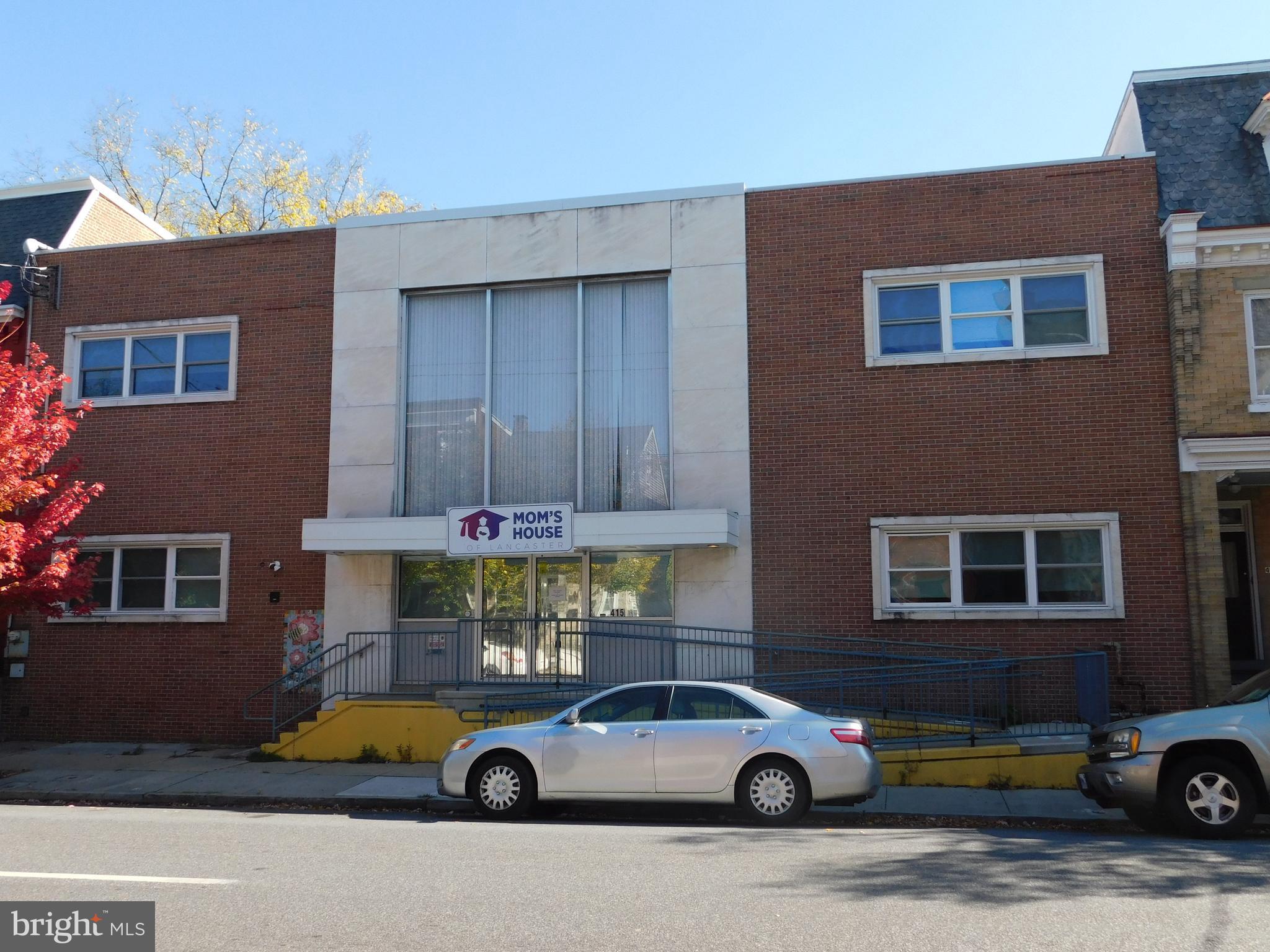 This downtown property was most recently used as a Day Care Facility.  The location offers good access to major and secondary highways.  The Mixed Use Zoning allows for residential, commercial, cultural, light industrial and other miscellaneous uses.  There are large rooms on each level, several office spaces and a first floor kitchen.  The building is in good condition with a newer roof (within 5 years).  Other improvements include accessibility ramp &handrails, new double hung vinyl windows with screens, window blinds, security cameras, intercom system, and a fenced children's playground.  Also upgraded HVAC system and upgraded electrical outlets.