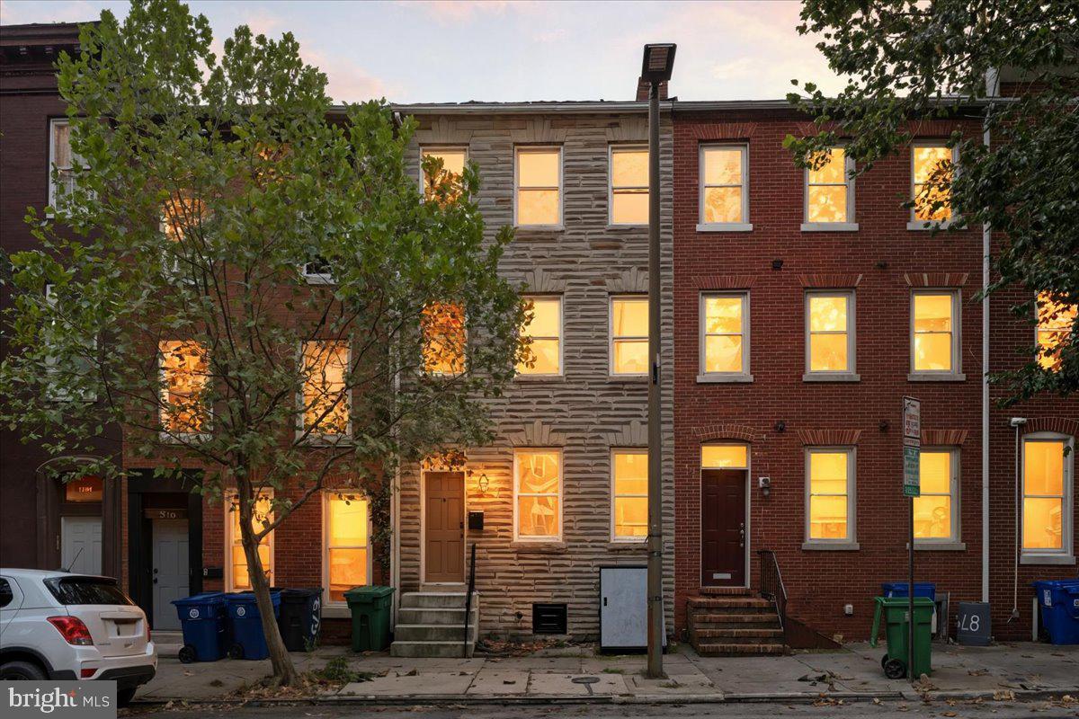 Charming home in the heart of Baltimore featuring exposed brick walls, rich wood floors, and a charming country kitchen with stainless steel appliances and an apron front sink. The main level offers a laundry area and half bath for added convenience. Upstairs, the second level includes two bedrooms and a spacious full bath with a soaking tub and separate shower. The third level provides two additional bedrooms, perfect for guests or a home office. Enjoy outdoor living with a rear deck overlooking the backyard. Ideally located near the University of Maryland, Downtown Baltimore, Camden Yards, M&T Bank Stadium, and major commuter routes. Potentially eligible for 4.99% 30 year fixed rate with preferred lender, call for details.