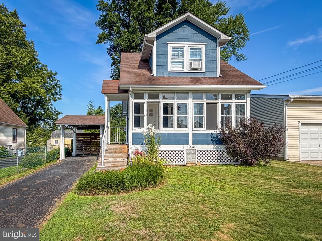Welcome to 1936 Fulton Ave, a charming Colonial that's perfect for first-time homebuyers or savvy investors. Lovingly maintained and thoughtfully updated, this home seamlessly blends character with modern conveniences, all in a location close to major thoroughfares, shopping, and everyday amenities. An ample front lawn, two-car driveway, and one-car carport provide plenty of curb appeal and parking. Step inside the inviting three-season sunroom, where walls of windows flood the space with natural light and built-in bench seating creates the perfect spot to relax. Inside, durable laminate flooring flows throughout the home. The open living room showcases exposed beams and seamlessly connects to the dining room, highlighted by tall baseboards and decorative ductwork that add to the home's unique charm. The efficient kitchen features butcher block countertops, hardwood cabinetry, a Haier refrigerator, a compact dishwasher, and a stylish subway tile backsplash. Just beyond the kitchen is a versatile bonus room currently used as a home office, but equally suited as a mudroom with direct access to the backyard deck. Upstairs, the hardwood staircase leads to two generously sized bedrooms. The spacious primary bedroom offers large windows, a walk-in closet with built-in bench seating, and convenient crawl space storage. The second bedroom also features abundant natural light and its own closet. Both bedrooms share a charming full bath complete with a tub/shower combination, a large frosted window, built-in storage, and a unique sink nook. The full unfinished basement provides outstanding potential for future living space, with new windows and ample room for a family room, laundry area, workshop, and additional storage. Outside, the private backyard is ready to become your personal retreat. Enjoy warm summer evenings on the expansive wood deck, surrounded by mature trees that create a peaceful, secluded setting. A storage shed adds even more functionality to this inviting outdoor space. Upgrades include new windows in most of the home and home stair treads on the outside steps. A home in this condition won't last long- be sure to check it out while it's still on the market!  Front Porch glass door is in the process of being painted.  Dining room back windows are painted and caulked shut.