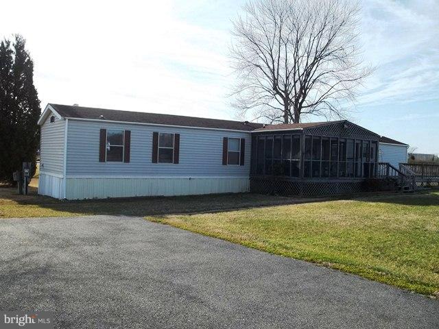 1.41 ACRE WATERFRONT HOMESITE WITH BEAUTIFUL VIEWS OF PINEY POINT CREEK. MOBILE HOME ON PROPERTY HAS BEEN VACANT FOR SEVERAL YEARS.  MIGHT BE LIVABLE BUT NEEDS WORK.  OUTSIDE HEATING UNIT HAS BEEN REMOVED.  **THE CURRENT PICTURES ARE OLD AND DO NOT REFLECT CURRENT CONDITION. STRICTLY AN "AS IS" SALE.