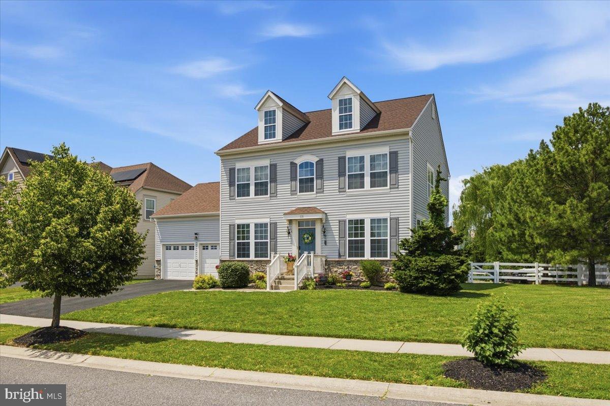 Nestled in the award winning Appoquinimink School District in Middletown, DE, 331 Plato Place is a charming, Traditional style home boasting 4 spacious bedrooms and 2 and a half bathrooms. Located on a premium lot in the desirable Village of Bayberry community, the home overlooks protected land conservation with beautiful walking paths and a community park. Step inside to discover a radiant open floor plan bathed in natural light. Beautiful bamboo floors span the main level while the living area is enhanced with soaring 10ft ceilings. The heart of the home, the kitchen, features a large island, pantry, an eat-in area, and stainless steel appliances which make for a warm yet functional space, perfect for family gatherings.  
The living area flows seamlessly onto the rear deck and stamped concrete patio, presenting a perfect setting for your morning coffee or al fresco dining. A fully fenced backyard also provides added privacy and safety. 
Ascend the stairs to the primary suite featuring a walk-in closet, an additional secondary closet, and an ensuite bathroom. Three more generously-sized bedrooms and another full bathroom round out the second story, ensuring ample living spaces for all. 
Not to be overlooked, the partially finished basement includes a pool table, an additional room with an egress, utility area, and an abundance of storage space. The future potential of an additional bathroom in the basement thanks to its rough-ins enhance the possibilities this home offers.  
Rounding out this stunning home is a convenient, 2 car attached garage that provides direct access to a mudroom off the kitchen. Featuring central A/C and a heating system with forced air, and the roof replaced in 2025, this home offers modern comforts and a welcoming charm. Ideal for those seeking to live in a vibrant community, 331 Plato Place is the dream home you've been searching for.