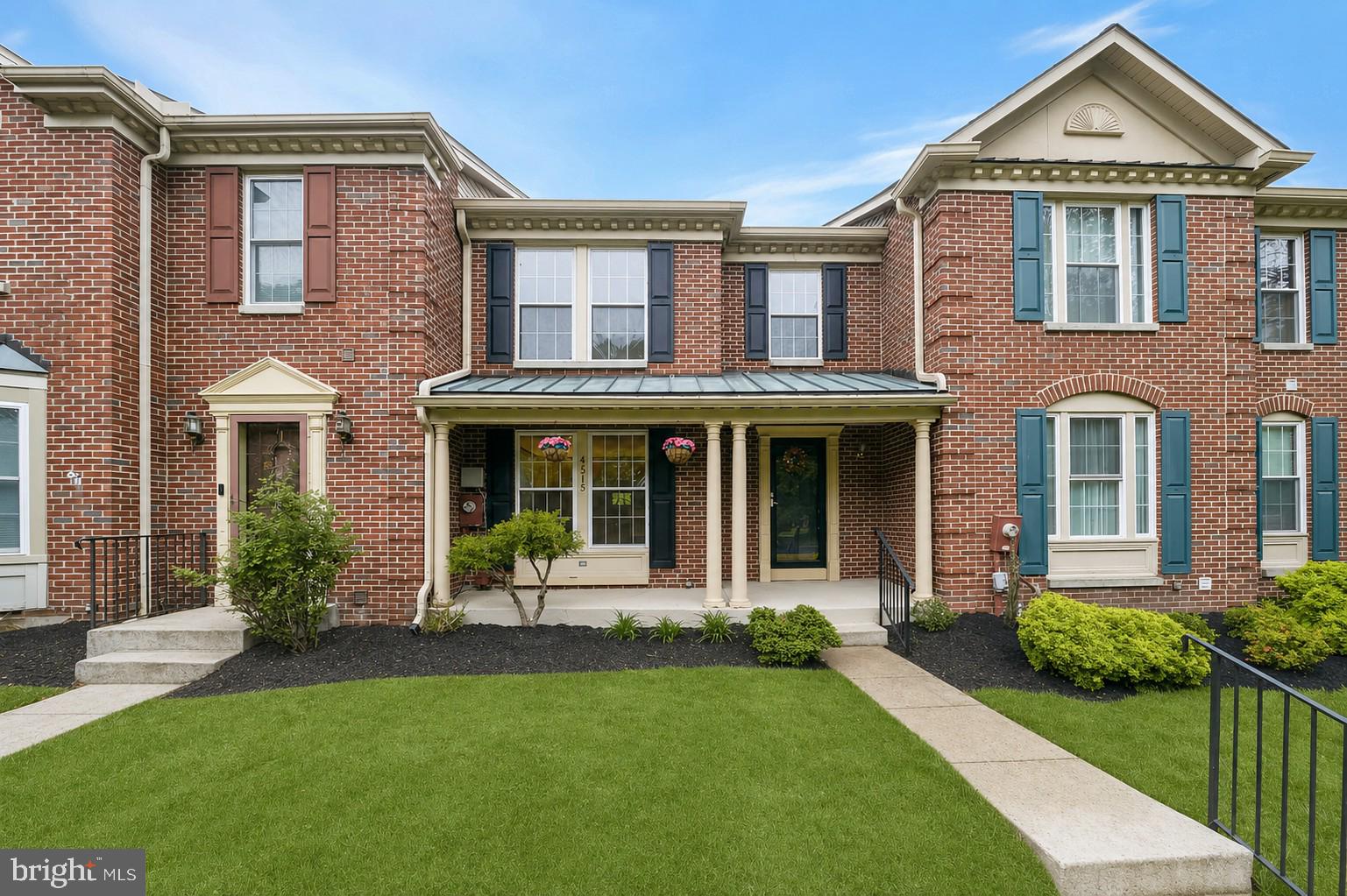 Beautifully maintained interior brick townhome ideally situated in the highly desirable Dorsey Hall community of Ellicott City, zoned for top-rated Howard County schools. This light-filled 4-bedroom, 4-bath residence offers an exceptional blend of comfort, style, and functionality.  A welcoming front porch opens into a bright foyer, where modern flooring flows seamlessly into the thoughtfully designed kitchen. Featuring luxury vinyl flooring, granite countertops, sleek appliances, ample cabinetry, a pantry, and a custom-built-in dining table with a matching granite surface, the kitchen is both elegant and highly functional for everyday living.  The adjacent dining area is accented with crown molding and opens into a spacious living room highlighted by a cozy wood-burning fireplace with a dentil-accented mantel, perfect for relaxing or entertaining.  Step outside to the expansive, fully refurbished deck and take in stunning wooded views. The home’s seamless indoor-outdoor flow creates a peaceful, private setting that truly feels connected to nature, ideal for entertaining or unwinding.  Upstairs, the impressive primary suite features a vaulted ceiling, a walk-in closet with a custom organizing system, and a spa-like en-suite bath complete with dual vanities, a glass-enclosed walk-in shower, and a skylight that fills the space with natural light. Two additional generously sized bedrooms, both with vaulted ceilings and brand-new carpeting, along with a full hall bath, complete the upper level.  The fully finished lower level offers exceptional flexibility, including a private office space with glass block accents for both privacy and light, a spacious recreation room with luxury vinyl flooring and ample storage, and a full bath. With direct access to a second outdoor deck, this level is ideal for guests, multigenerational living, or extended entertaining.  Thoughtfully remodeled by skilled local craftsmen, the home also features all-new carpeting throughout. The dishwasher and washing machine were recently replaced (2024–2025). Conveniently located near major commuter routes, including US-29, MD-100, and I-70, this home offers both comfort and accessibility in a sought-after community.