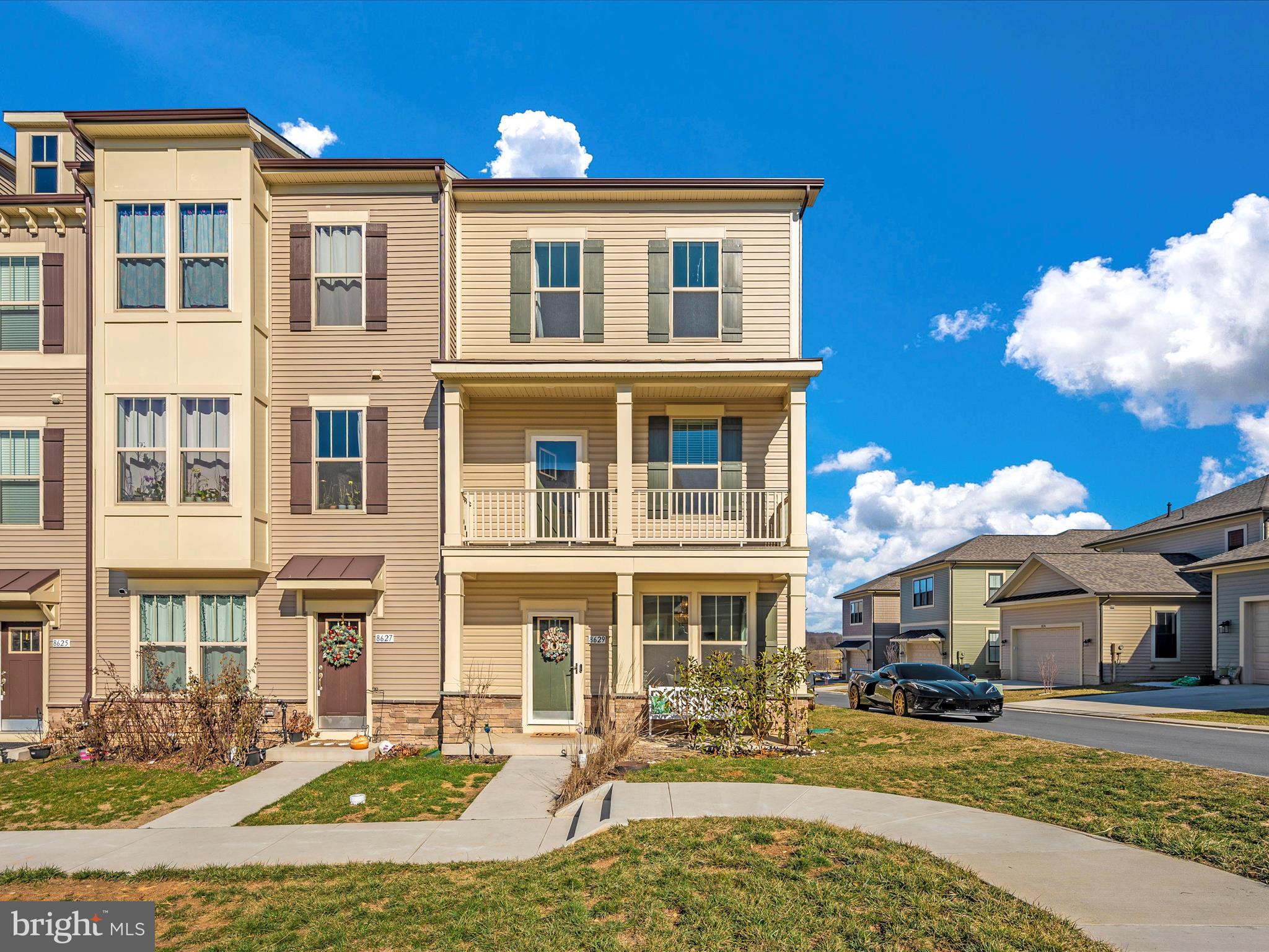 **IMPROVED PRICE** Welcome to your dream townhouse in the Villages of Urbana, located in the sought-after Stone Barn Community! This stunning end unit spans four levels and offers spacious, modern, and upgraded amenities in an unbeatable location.

The entry level features an office space that's easily convertible into an additional bedroom, and a full bathroom, a space that is perfect for accommodating guests or creating a home office. The convenience of an attached two-car garage adds to the appeal.

On the main floor, discover a family room, dining area, and a large, upgraded kitchen complete with soft-close cabinets and quartz countertops. Accessible from the kitchen, a full deck awaits, ideal for hosting gatherings, while a front porch off the family room provides additional outdoor space. A convenient half bathroom completes this level.

The third floor presents a spacious Primary Suite with a walk-in closet and a luxurious full bathroom featuring tile floors and shower. Two additional bedrooms and another full bathroom offer ample space and comfort for family or guests.

Ascending to the fourth floor reveals a versatile loft with its own walk-in closet and full bathroom, featuring tile floors and shower. From the loft, soak in breathtaking views of Sugarloaf Mountain from the incredible rooftop lounge space.

Living in the Villages of Urbana means easy access to commuter routes, nearby grocery stores, and restaurants. Plus, enjoy access to all the amenities the community has to offer, including the newly completed Stone Barn Community Center, just a short walk away.

Don't miss out on this incredible opportunity to experience the best of Urbana living. Contact us today to schedule a viewing and make this townhouse your new home!