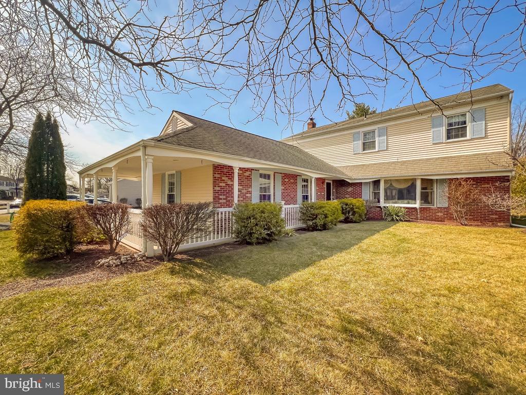 Unique Opportunity to find a true In-Law Suite on the 1st level with private entrance, generous bedroom, separate sitting room, and a dry-bar kitchenette.  The 1st flr powder room has been converted to a full bathroom. The laundry room is shared.   A full front wrap around porch is just as attractive in the day as it is illuminated in the evening. Upon entering this 5-bedroom colonial notice the attention to detail and pride of the ownership.  You will be drawn to the cozy fireplace in the family room and beautifully remodeled kitchen featuring a breakfast nook. Imagine entertaining family and friends in the outdoor living room as an extension of the family room. This home has more space and possibilities than you could imagine with 3 full baths, and 4 bedrooms upstairs. The master bedroom has a walk-in closet for all your storage needs and en-suite bath. Located in sought after Maple Point, walking distance to the Maple Point schools and park; super convenient to all shopping, commuting routes and train. Pillar to Post Home Inspection Home  Report is available upon request.