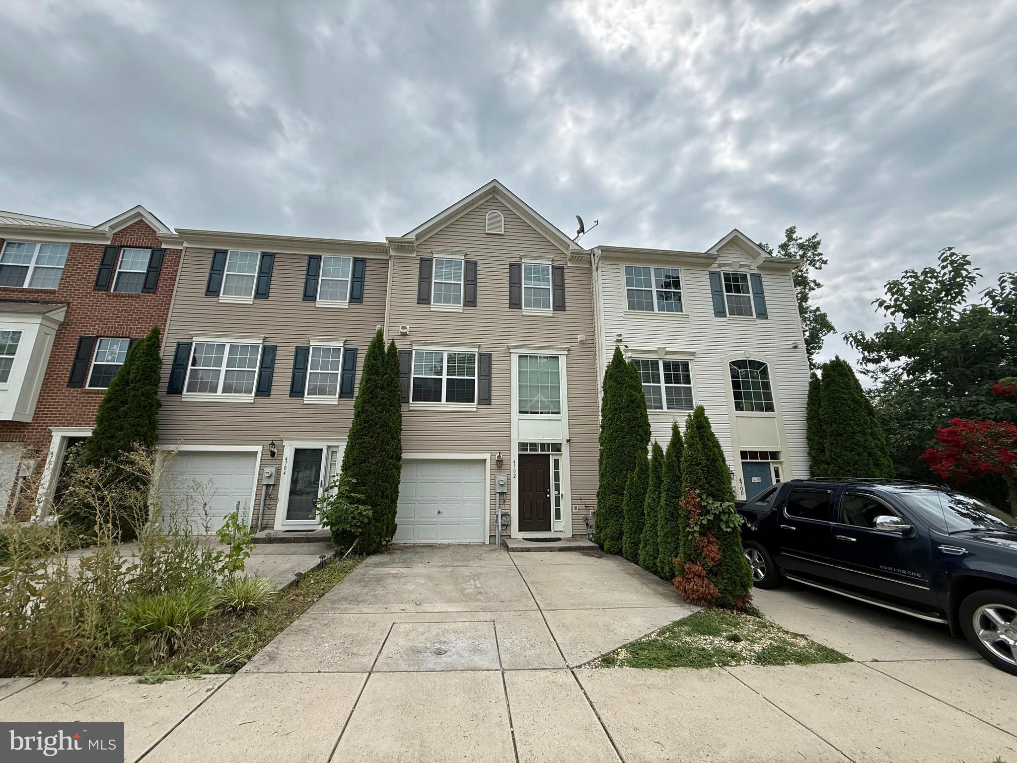 Property is subject to third-party approval. This townhome features 3 bedrooms and 2.5 bathrooms.
The main level boasts an open floor plan featuring a bright and inviting living room, a convenient powder room, and a well-appointed kitchen with 42-inch cabinetry, granite countertops, and a breakfast nook. The living and dining room combination, complete with a cozy fireplace, provides the perfect space for entertaining and offers direct access to the rear deck.
Upstairs, the spacious primary suite features a luxurious en-suite bath with double vanities, a soaking tub, and a separate walk-in shower. Two additional generously sized bedrooms and a full hall bath complete the upper level.
The lower level offers a spacious additional living area, perfect for a family room, recreation room, home office, or workout space, and includes a rough-in for a future half bath. This level also features a convenient laundry room, interior access to the attached one-car garage, and walkout access to the fenced rear yard.
Ideally located just minutes from shopping, dining, entertainment, parks, and major commuter routes, this home offers the perfect combination of comfort, convenience, and style.