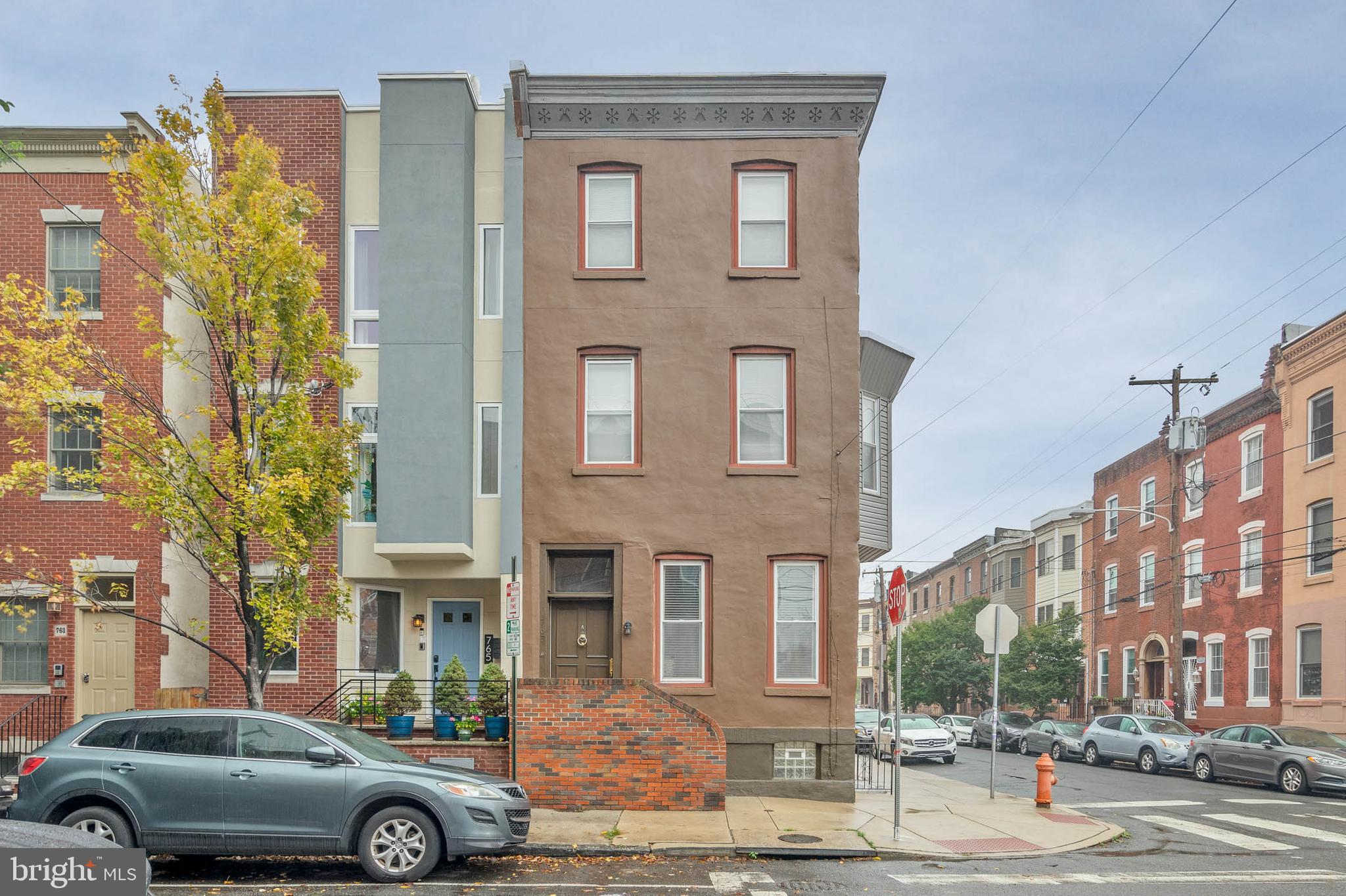 Incredible, fully occuped, Triplex in the heart of Graduate Hospital with parking. Welcome to 767 S. 15th Street, an amazing multi-family property that features one, 3 bedroom unit and two, 2 bedroom units, plus garage that's currently being used as storage! Unit A features 3 bedrooms, 2 baths and rents for $3150, 7/28/27. Unit B has 2 bedrooms, 1 bath, $2000, 6/28/27. Unit C is a 2 bedroom, 1 bath,  $1900, 7/28/27. The garage is currently vacant but is projected to bring in $450 monthly.  These beautiful apartments all have hardwood and tile floors, updated kitchens and baths and in-unit laundry. Please check out the Income and Expenses in the documents section. Super convenient location close to shopping, restaurants, public transportation, the Center City business district and so much more! Some photos are from previous listings.