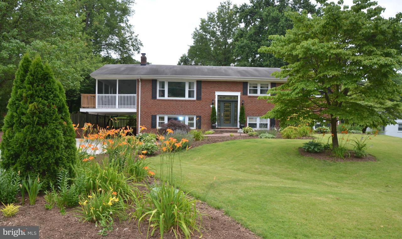 Spacious 5BR 3BA on 1/2 acre lot in sought after Mount Vernon on quiet street, many updates, close to Fort Belvoir. Large kitchen w/SS appliances. Renovated lower level, upgraded flooring, closets throughout. Screened porch over carport, patio in fenced back yard, both ideal for entertaining. Oversized driveway, fenced yard, beautifully landscaped.