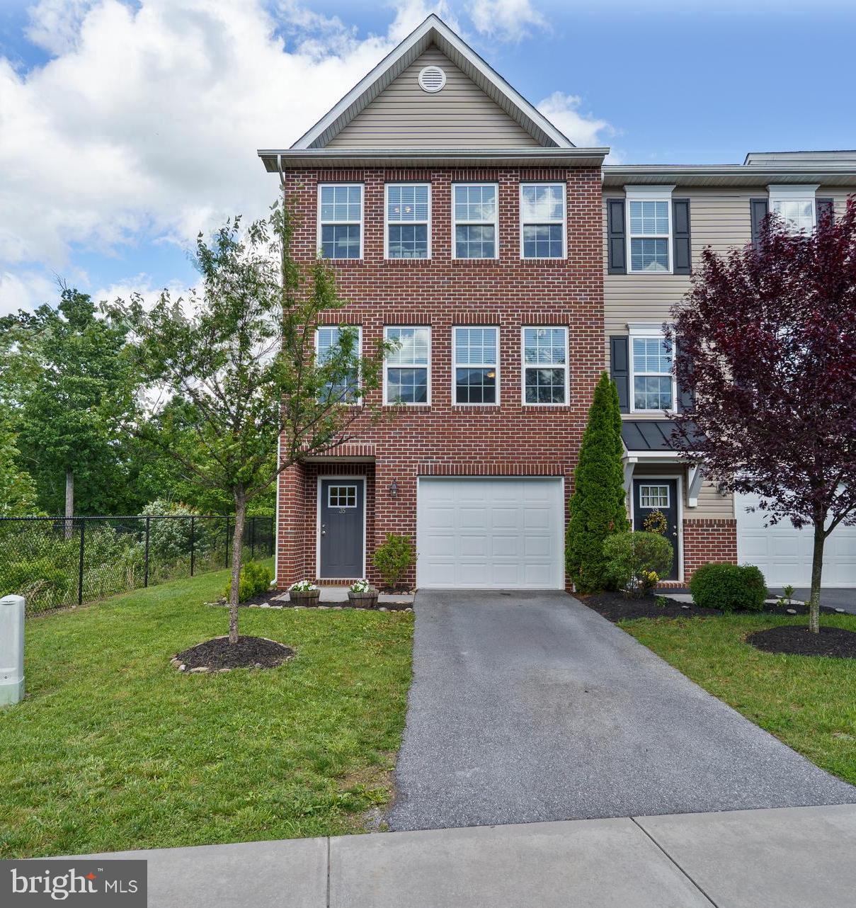 You won't want to miss out on this one located in sought after Brookfield on the Potomac. This community offers private river access along with boat ramp and picnic area. This pristine Panhandle Builders three-story brick 1 car garage, end unit townhouse showcases a private backyard and an inviting 16 x 8 deck. Open main floorplan offers a kitchen with center island with pendent and recessed lights, stainless steel appliances, and tons of cabinet space the is easy access to the rear deck which makes it perfect for entertaining. The front light-filled family room offers brand new carpet and access to a half bath. The upstairs has three bedrooms including a primary suite featuring walk-in closet along with dual sinks and walk-in shower. The finished basement features an area that can be used as a fourth bedroom/workout area/extra living space. There is also a half bathroom located on the basement level that walks out to the backyard. Not only does this townhome offer everything you need and more, but it's prime location is key.  Savage Ct is a quaint cul-de-sac with sidewalks and street lights.  It is located near I-70 and I-81 , so great for those who you commute. This home has so much to offer and it will not disappoint! Schedule your showing today!!