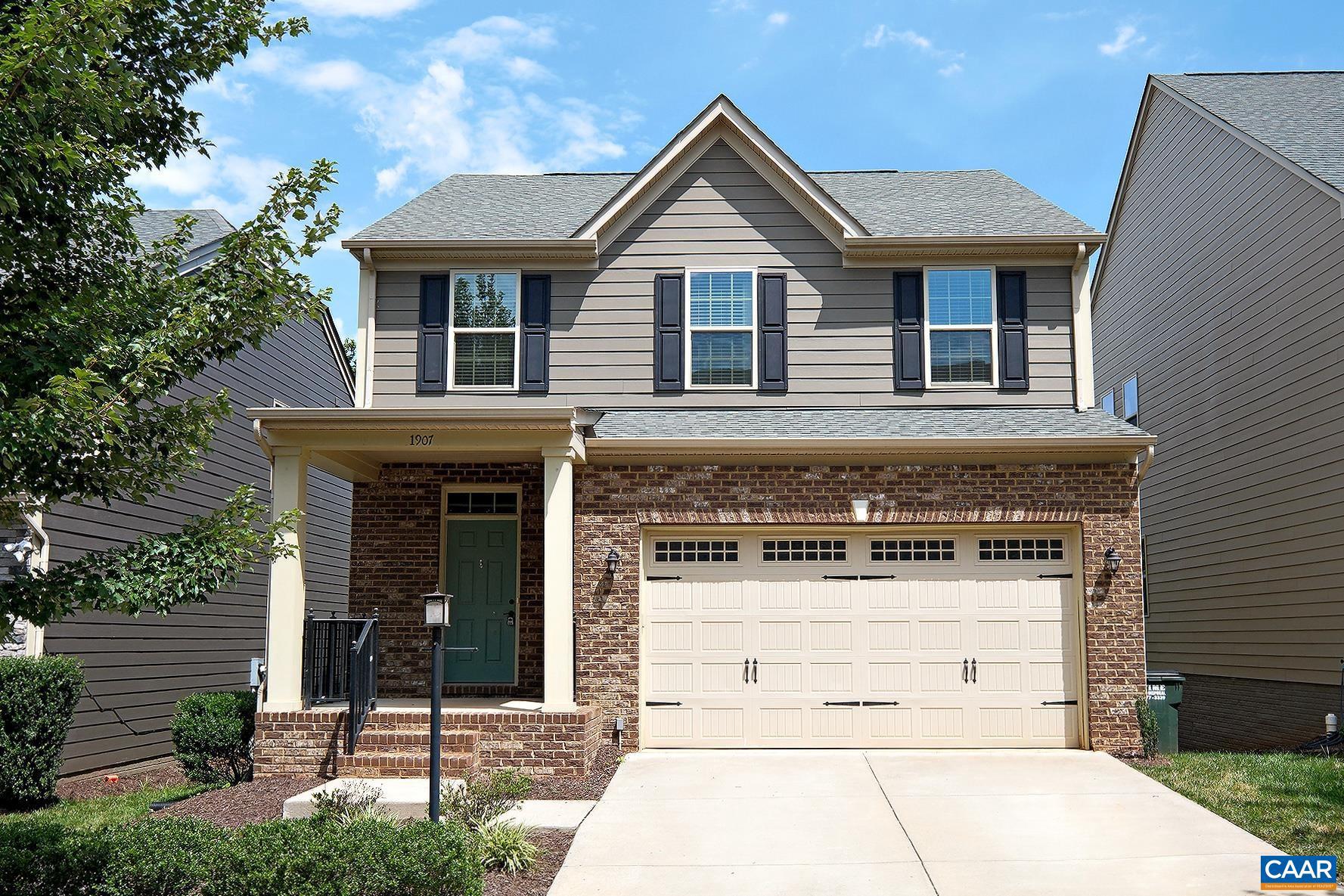 Move-in Ready! Nestled within the sought-after Cascadia neighborhood, this dog-friendly 4 bedroom home offers convenience to shopping, dining, the 250 bypass and I-64. Just a short drive from UVA and downtown. Outdoor enthusiasts will appreciate the proximity to the Rivanna River and Darden Towe Park. Plus, Cascadia offers fantastic amenities like playgrounds, a pool, a clubhouse, a community garden, and walkable sidewalks.  Step inside the 3,135 sqft home and be greeted by luxury vinyl plank flooring and modern finishes. The main level includes a living room with a fireplace, an open kitchen with granite counters and ss appliances, a bright sunroom, a dining room, and a half bath. Upstairs you will find newly installed LVP floors, a primary bedroom with a walk-in closet and en-suite full bath, plus 3 additional bedrooms that share a hall bath, and a walk-in laundry room (w/d included).  The walk-out lower level offers newly carpeted floors, a full bath, a large family room area, and a bonus room - perfect for a guest bedroom or home office. Two unfinished spaces offer ample storage space. Step out on the large back deck and enjoy the wooded setting. The backyard is fenced which will allow your small dogs to roam. No cats allowed.