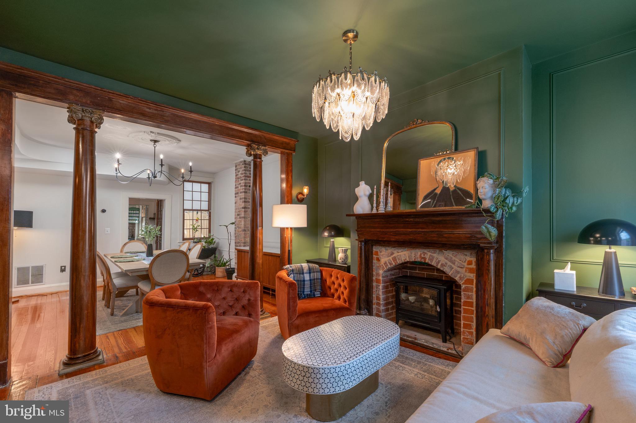 Welcome to 521 South Ann Street, a thoughtfully updated Fells Point home tucked into one of Baltimore’s most loved historic neighborhoods, where daily life feels walkable, local, and quietly elevated.

This location leans into a true wellness-forward city lifestyle. Start the morning with matcha at the new Library 19 location of Equitea, walk to Pilates House for a class, zen out at Sedona House with a slow-flow session, enjoy chai at The Daily Grind, or grab Zeke’s coffee at Pitango. Browse Greedy Reads, stroll the waterfront, or ease into the weekend with the Saturday Farmers Market just minutes away. Local shops, neighborhood cafés, and some of Fells Point’s favorite restaurants are all close by, with neighborhood icon Peter’s Inn right across the street.

Inside, the home blends classic rowhome character with smart, design-forward updates. The main level offers comfortable living and dining spaces with upgraded paint, designer lighting, and custom built-ins that add both function and style. The spaces feel warm, polished, and easy to live in, whether you are hosting friends, working from home, or settling into a quiet night in.

Upstairs, the second floor offers generous bedroom space, a renovated bathroom with elevated designer finishes, and the major convenience of relocated second-floor laundry. It is the kind of practical improvement that makes everyday living feel easier. The third floor adds even more flexibility, ideal as a private bedroom retreat, guest space, office, studio, or bonus lounge.

Out back, a quiet outdoor space offers a private place to unwind, sip your morning matcha, dine outside, garden, or simply enjoy a slower moment in the middle of the city. And with Area 16 permitted parking available, you get added comfort and convenience in one of Baltimore’s most walkable neighborhoods.

Historic charm, updated interiors, thoughtful improvements, and a location that puts the best of Fells Point living right outside your door. 521 South Ann Street is city living with a softer, more intentional rhythm.