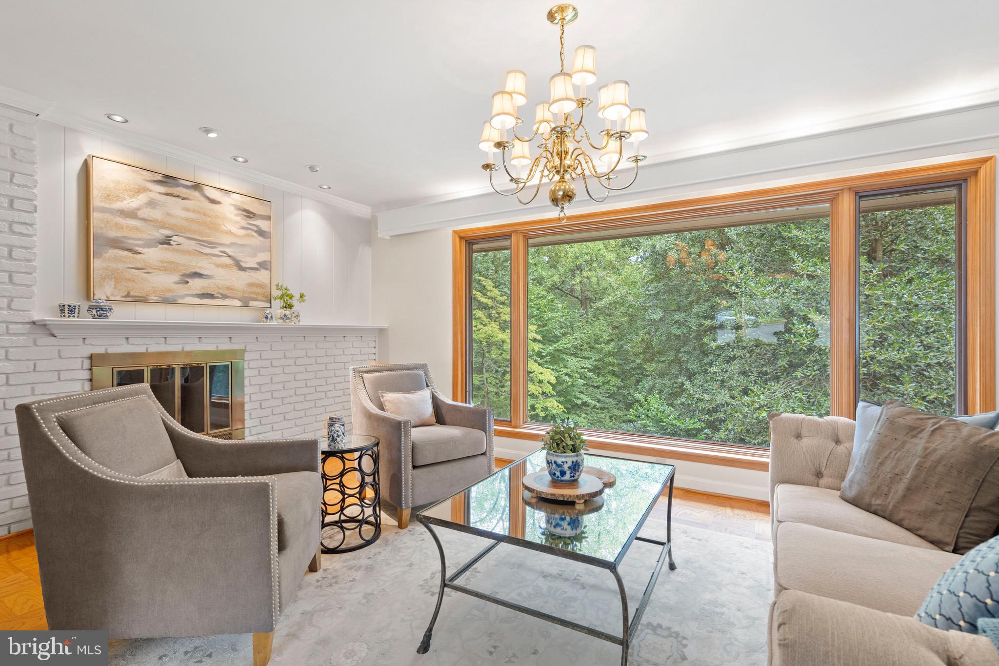 Tucked away on a quiet cul-de-sac and nestled on a rare 1.23-acre wooded lot in North Arlington, this mid-century brick rambler offers endless possibilities. Built in 1954, this 4-bedroom, 3-bath home combines vintage charm with abundant potential — perfect for buyers seeking to renovate, expand, or build new in a prime location. Inside, you’ll find a spacious layout featuring expansive windows that frame lush, tree-filled views and flood the home with natural light. Recent updates include: Original hardwood floors revealed and recoated on the main level, fresh whole-house repaint in Sherwin Williams Shoji White, new luxury vinyl plank flooring in the basement rec room and bedroom, designer sheet vinyl installed in the laundry room.

The lower level boasts a brick fireplace and sliding doors to the backyard, along with a two-car garage — affectionately nicknamed the "Garage-Mahal" for its size and versatility.

While the kitchen and baths are ready for a refresh, the property’s size and setting open the door to multiple options for customizing this property to be your forever home!  Perhaps you like the space and want to take on a renovation to bring a fresh look to the kitchen and baths.  Other neighbors have added a second level to similar homes (see some conceptual rendering in the photos).  Some may want to tear down and build a beautiful new home or even try to subdivide the lot (with resource protection area considerations) to build two new homes contingent on County approval.

Opportunities like this don’t come along often in this established and sought-after neighborhood. Revel in entertaining, gardening, and observing local wildlife before stepping out to greet neighbors on the adjoining cul-de-sacs or,  explore into the nearby parkland along the Potomac River and C&O Canal. The home also resides within the Donaldson Run Recreation Association pool boundary.

Zoned for Jamestown Elementary, Williamsburg Middle, and Yorktown High School, this home enjoys a prime location just minutes from Chain Bridge and GW Parkway, facilitating swift commutes by car, bus or bicycle to D.C. and Tysons Corner.  A coveted address not to be overlooked.  Bring your vision and make 3020 N Peary Street a fabulous home again!