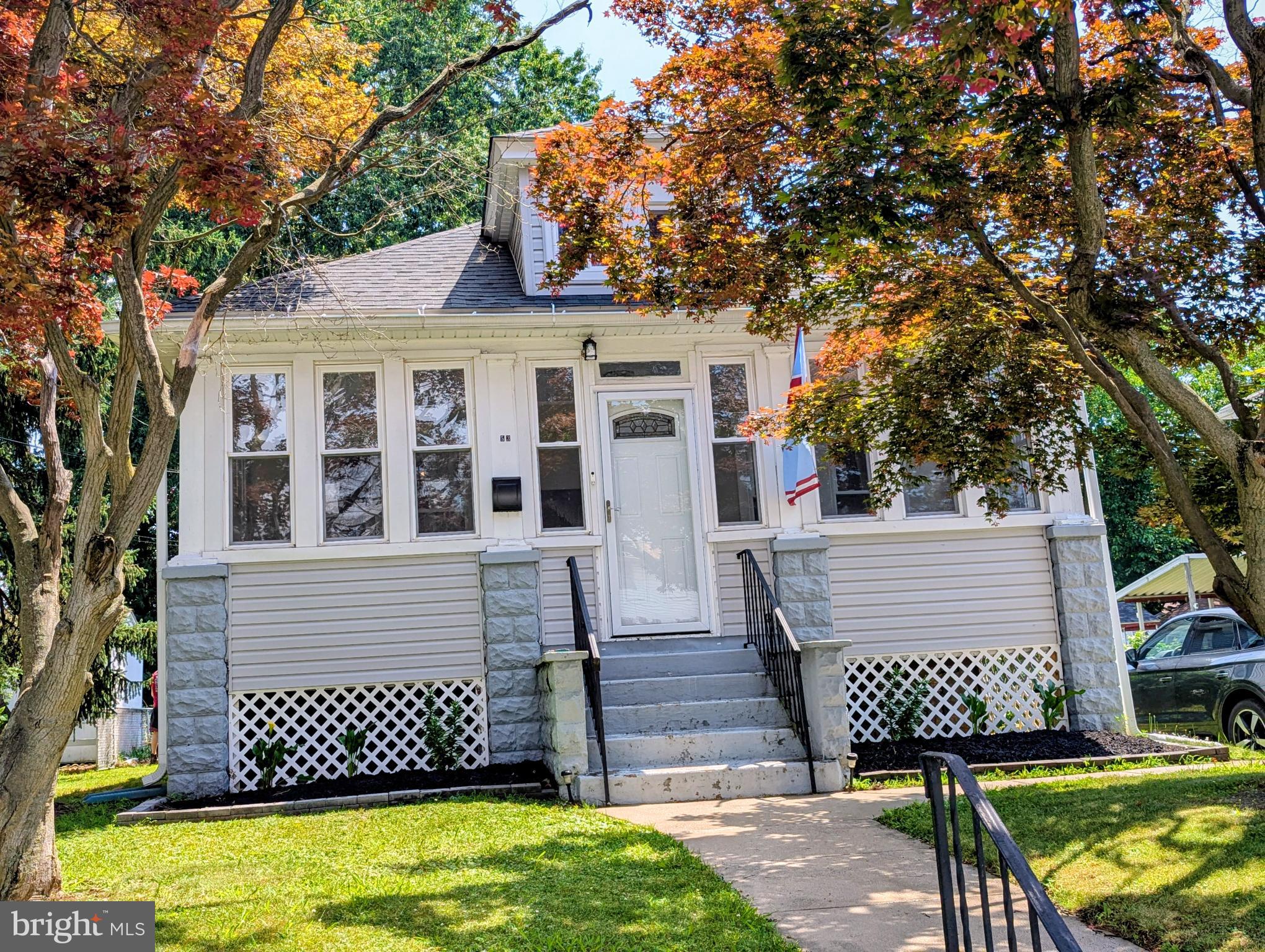 This charming 1935 ranch-style bungalow offers a perfect blend of classic character and modern comfort. With 1,411 square feet of thoughtfully designed living space, this home features two bedrooms and a full bathroom equipped with a tub shower, ideal for unwinding after a long day. The home was renovated 2022; new int/ext doors, tilt-in windows, kitchen, bath, heater, central air. The front 3 season sunroom is a delightful additional space to relax. Step inside to discover an inviting open floor plan that seamlessly connects the living and dining areas, enhanced by luxury vinyl flooring that creates a warm ambiance. The sunny eat-in kitchen is a delightful space for culinary adventures, complete with two new pantries for all your storage needs and modern stainless-steel appliances, including a self-cleaning gas oven, microwave, dishwasher and refrigerator. The exterior boasts low-maintenance vinyl siding, complemented by a lovely new spacious composite deck off the kitchen perfect for morning coffee or evening gatherings. Enjoy the convenience of a driveway with space for two vehicles, and take advantage of the nearby commuter rail station, making travel a breeze. The full basement, with interior access and windows, offers endless possibilities for customization, whether you envision a workshop, additional storage, or a cozy retreat. The neighborhood features sidewalks, street lights. walk to a Blue Ribbon and State of the Art Parkside Elementary School and walk to the "Delco" Famous Phil & Jims Hoagie Shop enhancing the community feel. This home is not just a property; it’s a place where memories are made. Experience the comfort and charm that awaits you in this delightful residence. Close drive to the Philadelphia International Airport, I-95, NJ and DE.