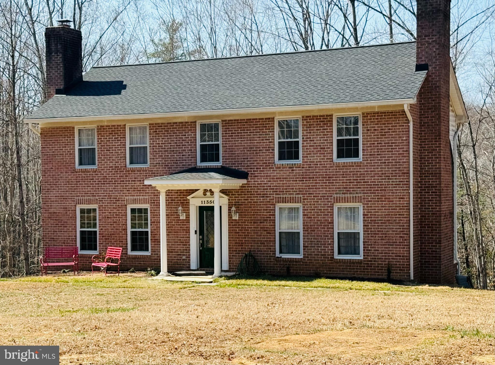 BIG PRICE ADJUSTMENT - Fantastic Opportunity to make this traditional center hall colonial a home of your dreams with over 3200 square feet.    House sits on 5 acres in a secluded private neighborhood of 15 homes.    Spacious Formal Living Room with wood burning fireplace that leads to a generous formal Dining Room with a view of the wooded rear of property. Kitchen includes a comfortable area for a table for family meals and conversation.  Additionally, the main level has a family room with another wood burning fireplace for casual gatherings of family and friends or quiet times.   Upper level has 5 light filled bedrooms.  Primary bedroom has an en suite full bath and with remaining 4 bedrooms sharing the full bath in the hall.  Lower basement level is unfinished, includes a third wood burning fireplace that will allow your creative thoughts to come to life.  Oakhurst Lane Owners have recently repaved by the entire road.   Roof  -2025, HVAC  - 2024 and Hot Water Heater - 2019.  Entire house is being sold "As Is". NO HOA - ALL OFFERS WILL BE PRESENTED WHEN RECEIVED.