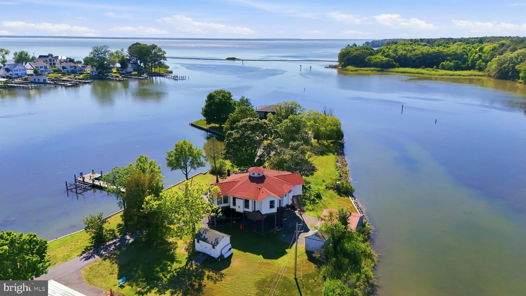 WOW what a view!  Enjoy the calm waters of Neale Sound w/ an awesome view of the Potomac and its notorious western sunsets.  This contemporary home is "octagon" in design by Topsider Homes out of North Carolina. Solid built and designed w/ post & beam construction and to endure hurricane force winds. The decks & screen porch is all done in Ipe. )Brazilian Ipe (pronounced ee-pay) is an ultra-dense, rot-resistant tropical hardwood native to Central and South America. ). The showers are equipped w/ body sprays, owners bedroom & guest room both have gas log fireplaces.  You love the built in counter stools that swivel! Stay tuned for details and professional photos. *1000LB electric open (cargo) Lift outside, perfect if you don't want to do steps or need to bring furniture up.  Pier & Dock. Flood Ins. approx. $1200 Annually. You have water on both sides.