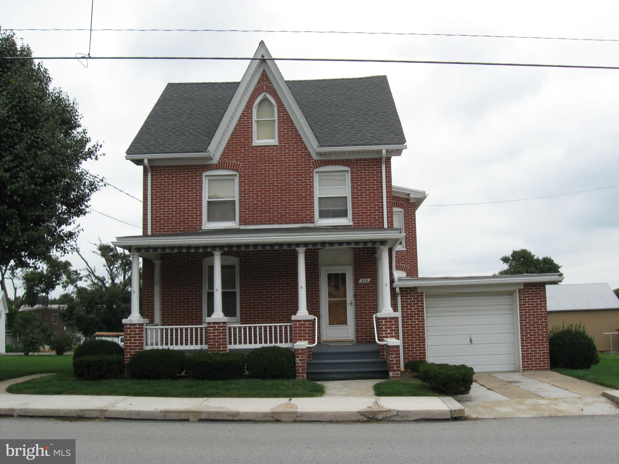 This grand old home has been in the same family since it was built! Gorgeous hdwd floors, exposed chestnut woodwork, built-in shelves & china cabinet, balcony off the master BR & more, all glowing with pride of ownership. Workshop in bsmt. Nice walk-up attic. 1-car garage plus huge outbuilding w/ 2 more spaces & storage. Superb level lot. Will not disappoint!