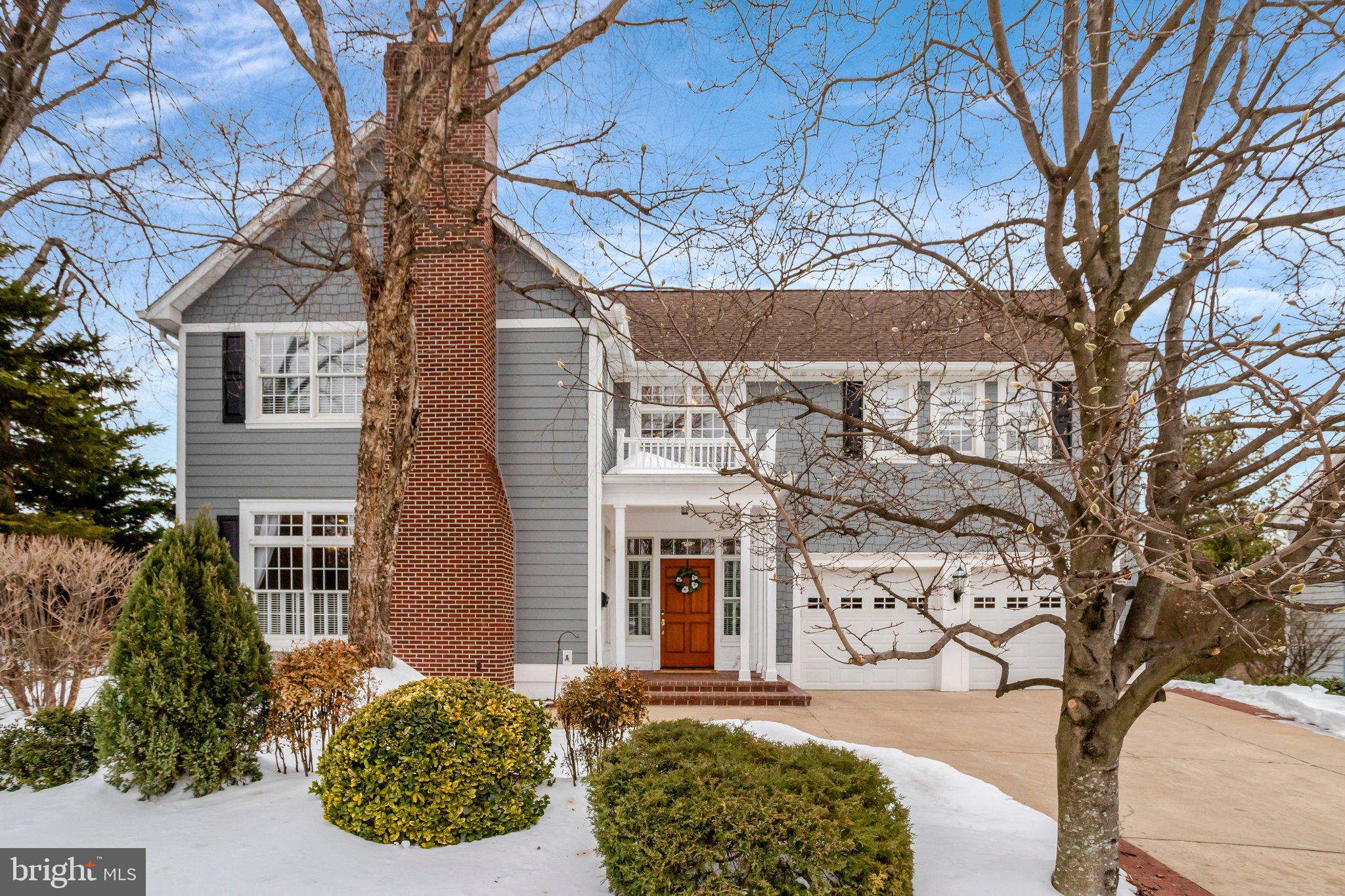 This newer home has been beautifully maintained and thoughtfully updated; it lives like a private retreat conveniently located in North Arlington. The first floor welcomes you with a wide, light-filled foyer, the traditional banister leading toward the second floor’s cathedral-pitched ceiling. In the front of the home, a more traditional layout offers an office (or is it a playroom? a music room? a library?) and a formal dining room. From there, the floor plan opens up into the heart of the home where the fully-renovated, light and bright, spacious and well-appointed kitchen connects seamlessly to the stacked-stone-gas-fireplace accented living room and then continues to the rear deck. The home’s architectural details are consistent and well executed; deep crown molding and baseboards, wainscoting and on-trend crystal light fixtures are a few of the many examples. Natural light flows in from the oversized windows and washes over the beautiful hardwood floors throughout the home. Unlike many homes in the area, the ceilings are high - 10-foot ceilings on the main level, while upstairs, cathedral ceilings highlight both the foyer and the Primary Bedroom. The expansive Primary Suite occupies one side of the upper level and includes a private balcony, a spacious bath and two walk-in closets. Three additional bedrooms are located across the hall, one with an ensuite bath. Well-sized bedrooms provide so many options, and the happy place at the top of the stairs is another incredible flex space. Full of light and airiness, it is currently the yoga / exercise spot. The in-home technology includes wired ethernet, a smart thermostat with temperature sensors, Arlo cameras, and a Honeywell security system. Since 2017, over $250,000 in thoughtful improvements have been made. The COVID-era renovation included a full kitchen and living room remodel with updated cabinetry, hardware, quartz counters, glass tile backsplash, crystal pendant lighting, LED recessed lighting, GE Café appliances, new hardwood floors and a gas fireplace with stacked stone surround. More recent updates include custom window treatments (including room darkening shades in two bedrooms and  room darkening drapes in the Primary Bedroom) (2023), fresh interior paint, new hardware throughout the home, new Kohler plumbing fixtures, a bathroom vanity and a new dryer (2025). The exterior has been intentionally redesigned over the past 8 years to ensure that you can enjoy your weekends in your resort-like back yard instead of spending your weekends working to maintain your resort-like back yard. A Fiberon composite deck with dusk-to-dawn lighting (2018) sports a 7-person premium hot tub and overlooks a landscaped yard with a garden pond, patio and putting green. Knowing that you have a 50-year architectural shingle roof (2019) and insulated Hardie Plank siding (2020) should help keep your mind at ease as you enjoy R&R in your private backyard. Location, location, location. Not many areas of Arlington have such easy access to restaurants, stores, parks, playgrounds, schools (Nottingham Elementary School and Bishop O’Connell HS are less than half a mile from the house), no car needed. A car is also unnecessary to get to the metro, but if a car is used, a Zone 9 parking sticker assigned to this address works near EFC Metro station as well, providing more parking options. If you are looking for a move-in ready home that is perfectly located and has been thoughtfully updated through the years to increase the possibility of relaxing weekends free of yard and home-work, look no further, this beautiful home awaits…  * Don't miss the Matterport 3D tour video, it is available in the listing * Summertime photos are included to highlight the lovely outdoor space that has been covered in snow! * A walkthrough video is coming * Recording devices in use in the home