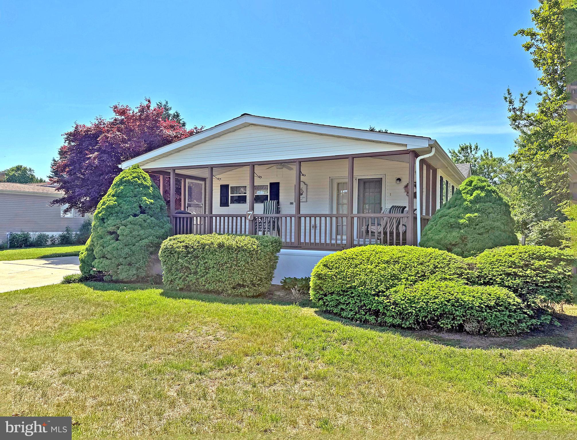 Sussex East/West is a leased-land, 55-plus* community (*up to 20% of owners may be younger than 55-years-old). Sussex East is located approximately 5.5 miles from the Lewes public beach, with the Cape Henlopen State Park beaches...and the famous Rehoboth Beach boardwalk not much farther away. This community has a unique location with direct access to the State Park’s hiking/biking trail through common groundsshed. This 3 bedroom 2 full bath manufactured home was built in 1994 and offers a newer vinyl plank floor in the kitchen and primary bath. The kitchen has an island and is open to the family room with access to a covered deck. Central Ac and newer furnace in 2024. New insulated skirting. Two pets are allowed in Sussex East, and they have a fenced dog park near the community’s indoor salt-water pool and a new pickle ball court. (Note: Family & friends may always visit, but rentals and subletting are NOT permitted in this community). Leasehold interest: Current Base Lot Rent, less any community related fees for trash/recycle and the State's RTF, is $628.81/mt. (Lease will renew again on July 1, 2027 with any increase capped as per 25 Del. C. Sec. 7050-7054). Homeowner pays electric, water, sewer, fuel (metered natural gas), recycling & lawn maintenance. RHP, the community owner, requires an Application from the Buyer, with acceptance based on the following criteria: 1.)income verification, 2.)favorable credit bureau score, including evaluation of debt-to-income ratio, and 3.)clean criminal background check. Financing may be available to qualified borrowers from only a few Lenders that specialize in installment/chattel loans for manufactured homes on leased land. Closing costs will include a 3.75% transfer tax (DMV Doc Fee) & a Settlement Agent fee.