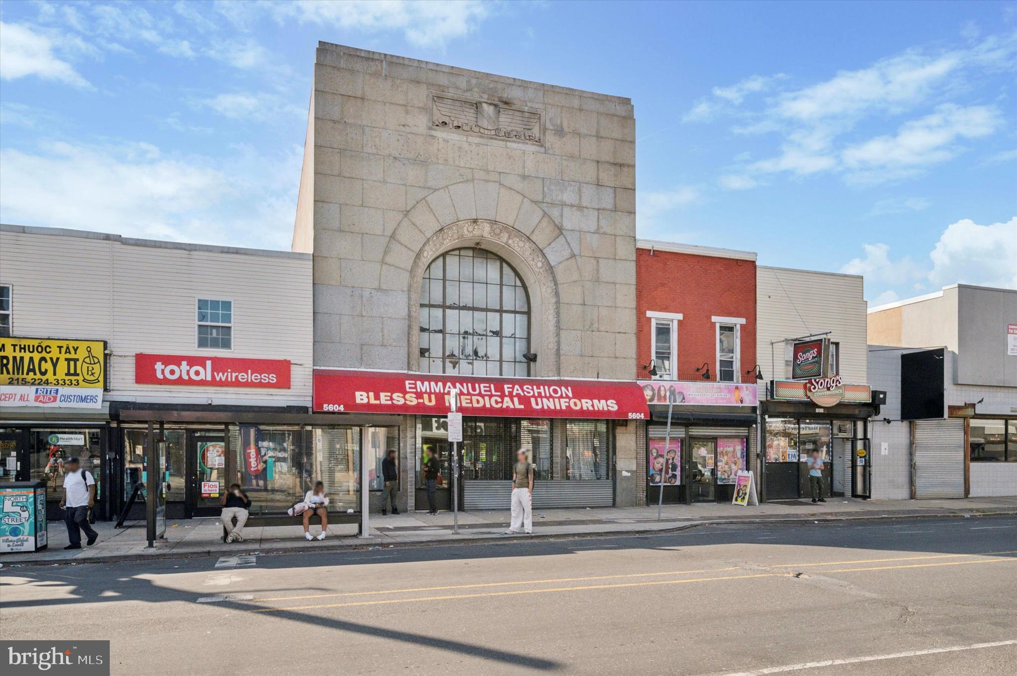 This versatile commercial property offers endless possibilities, ideal for retail, office, or mixed-use development. Originally built in the 1930s as a bank, the space retains its iconic large vault with lock boxes, providing a unique focal point for a creative transformation.

The property spans 5,520 sq. ft. across three stories, featuring 22 office-like suites/rooms and 6 full bathrooms equipped with standing showers. The main entrance, formerly a storefront, can easily be transformed into a welcoming lobby area. The recently renovated HVAC system ensures central air throughout the building, complemented by an updated water heater.

Situated in the heart of the Olney neighborhood in North Philadelphia, the property sits on a heavily trafficked block surrounded by commercial establishments, including pharmacies, restaurants, beauty salons, and retail stores. Its zoning, CMx2, supports a wide range of commercial uses, making it perfect for medical offices, charter schools, or similar multi-room setups.

Additional features include onsite parking, installed security cameras, a door armed with a code system, and fully functioning storefront security gates. The building is vacant and ready for its next owner to customize.