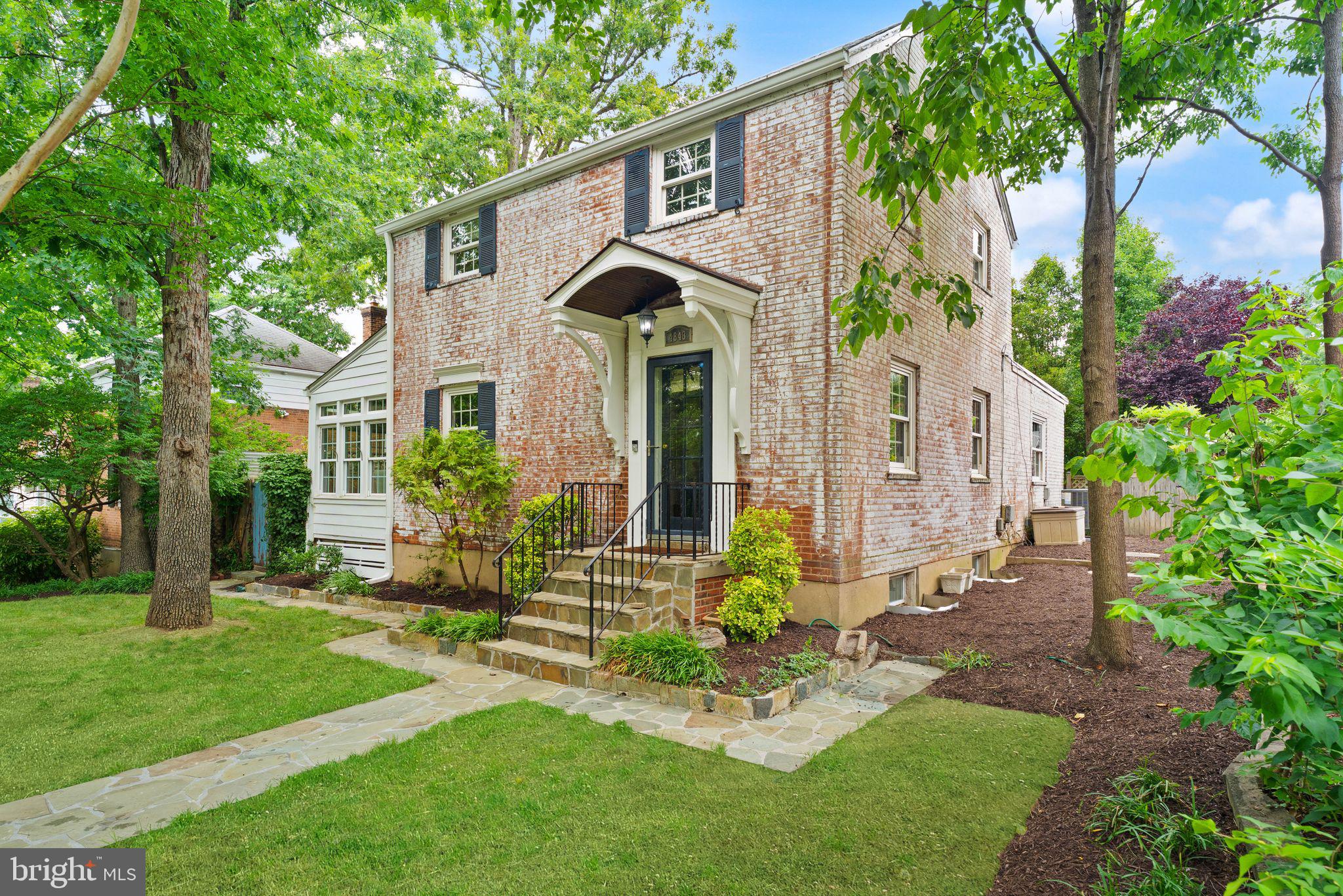 ***There is a service road between the house and Arlington Blvd, it does not sit right on the road***Welcome to this charming Colonial, tucked back from Arlington Boulevard and thoughtfully updated to offer the perfect balance of timeless character and modern living in one of Arlington’s most desirable locations.

Extensively renovated and filled with natural light, the home exudes warmth and comfort from the moment you step inside. The spacious living area flows effortlessly into the kitchen, creating an ideal layout for both everyday living and entertaining. A true centerpiece of the home, the kitchen features high-end Wolf and Sub-Zero appliances, elegant marble countertops, and a stunning breakfast nook surrounded by windows—an inviting spot for morning coffee, casual meals, or quiet afternoons overlooking the yard. Just off the kitchen, French doors open to a charming patio, perfect for outdoor dining, entertaining, or unwinding at the end of the day.

Beyond the kitchen, a hallway leads to a generously sized bedroom and a beautifully renovated full bathroom. You’ll also find a charming mudroom with direct access to the backyard, adding both functionality and everyday convenience.

Upstairs, three well-appointed bedrooms and a full bathroom provide comfortable accommodations, with the bathroom stylishly enclosed by a modern barn door that adds character and charm.

The lower level completes the home with ample storage space and a versatile bonus room that has previously been used as a wine room. Whether envisioned as a home gym, tasting room, playroom, hobby space, or additional lounge area, the possibilities are endless.

Complete with a one-car garage and thoughtful upgrades throughout, this exceptional home offers a rare combination of charm, sophistication, and convenience in the heart of Arlington.