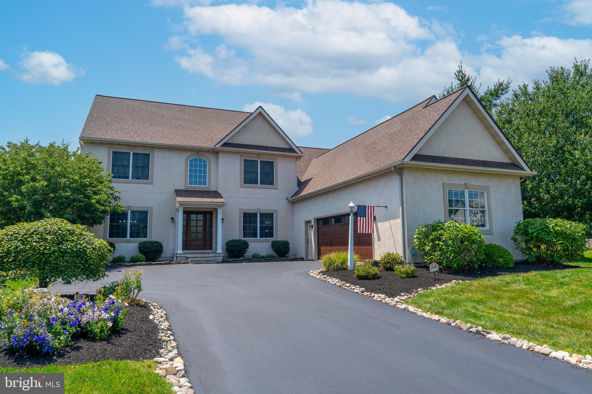 Welcome to 1146 S. Bristol Drive—an exceptional 5-bedroom, 3 full and 1 half bath home offering over 4,600 square feet of finished living space in the Laurel Pond community of Manheim Township. Beautifully positioned on a private corner lot backing to mature trees, this meticulously maintained residence combines expansive living spaces, thoughtful updates, and resort-style outdoor amenities to create a home equally suited for everyday comfort and exceptional entertaining. 

Inside, a bright and inviting layout showcases soaring tall ceilings, elegant architectural details, and beautifully appointed living spaces throughout. The welcoming foyer opens to an office area and formal dining room, while the spacious living room features a striking stone gas fireplace with mantel, creating a warm focal point for gathering with guests. At the heart of the home is the beautifully updated gourmet kitchen, complete with quartz countertops, a large, two-tiered center island with breakfast bar seating, abundant cabinetry, pantry, and direct access to the rear covered paver patio overlooking the pool area. Designed for effortless entertaining, the kitchen also flows seamlessly into the adjoining living spaces, creating an ideal setting for hosting both intimate dinners and larger gatherings. A main-level laundry room with built-ins and a stylish powder room add everyday convenience. 

The massive main-level primary suite provides the ease of first-floor living while serving as a luxurious private retreat. Complete with a spacious walk-in closet and an elegant en-suite bath featuring a jetted soaking tub, walk-in shower, and custom built-ins, this thoughtfully designed space offers both comfort and privacy. 

Upstairs, four generously sized bedrooms provide exceptional, flexible accommodations. One bedroom features its own private attached bath, while the remaining bedrooms are served by an additional full bath. A versatile loft overlooking the foyer creates the perfect space for a reading nook or additional lounge area. 

The fully finished lower level significantly expands the home's versatility, offering a spacious recreation room with home theater amenities, dedicated exercise area, generous storage areas, and additional flexible space for hobbies, gaming, media, or entertaining. Whether hosting guests or creating your own wellness retreat, this level offers endless possibilities. 

Outdoor living is incredibly impressive. Step outside to extensive hardscaping, a private saltwater in-ground pool, beautifully landscaped grounds, and multiple patio areas designed for relaxing and entertaining. Backing to mature trees, the backyard offers a peaceful setting with exceptional privacy, making it the perfect place to enjoy summer gatherings or quiet evenings outdoors. 

Additional highlights include an oversized attached 2-car garage with built-in storage and workshop space, engineered hardwood flooring throughout much of the main level, updated systems and finishes, and an excellent location within the Manheim Township School District. Residents of Laurel Pond enjoy access to community basketball and tennis courts while remaining just minutes from shopping, dining, healthcare, downtown Lititz, Lancaster City, and major commuter routes. This exceptional property offers the perfect blend of luxury, functionality, and location. Schedule your private showing today!