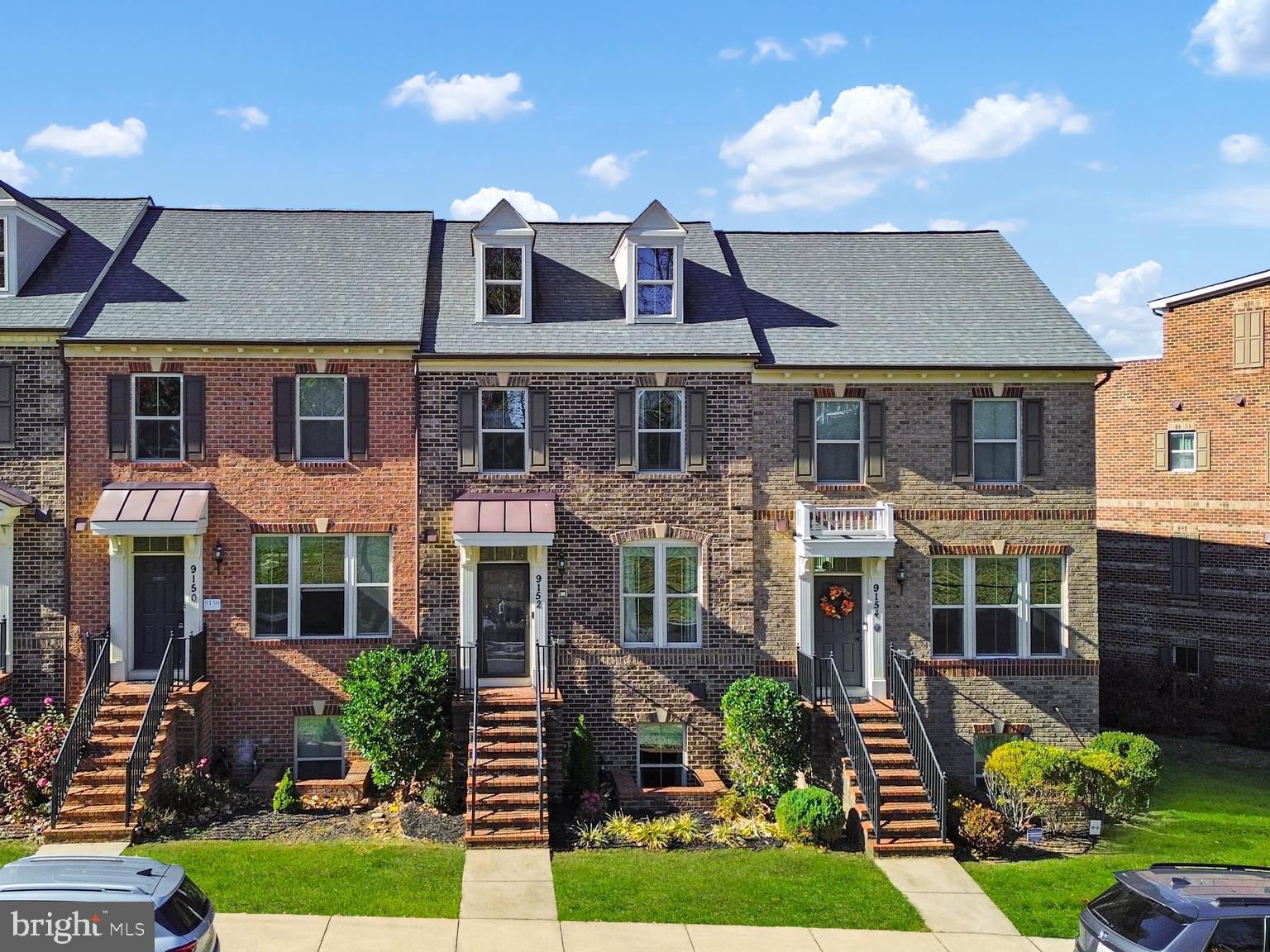 This beautiful brick-front Urbana townhome.Upstairs, you'll find three spacious bedrooms and two full bathrooms. The Primary bedroom suite is a true oasis, featuring a large walk-in closet and an en-suite bathroom with a tiled shower, soaking tub, and dual stone vanity. The two other bedrooms on this level are upgraded with ceiling fans and feature spacious closets. This level also features a convenient laundry room complete with shelving. The lower level features an additional light-filled spacious bedroom and another full bathroom—providing a private retreat for maximum guest privacy. Enjoy easy communication throughout the house with the upgraded intercom system. From this level, enjoy access to the two-car garage. There are plenty of places to park, including the two-car garage, the two-car driveway and guest street parking in the front and back of the house. Situated in a convenient commuter location and in the highly desirable Urbana school district, known for its Blue Ribbon schools, this home is in a great location! Enjoy the convenience of being near the library, grocery store, restaurants, 3 resort-style pools, great work-out facilities, tennis, basketball, pickleball and plenty of HOA-run events!