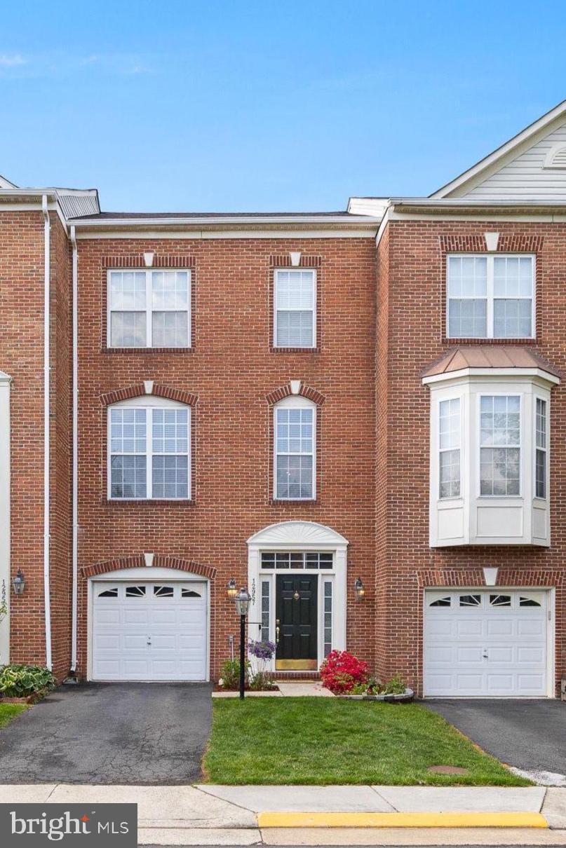 Welcome to this exquisitely renovated Colonial townhouse in the highly coveted Woodland Park community, where timeless elegance meets modern sophistication. Offering 3 bedrooms and 3.5 bathrooms, this exceptional residence showcases an open, light-filled floor plan enhanced by rich hardwood flooring and refined finishes throughout.
Designed for both elevated everyday living and effortless entertaining, the gourmet kitchen features stainless steel appliances, a double oven, cooktop, expansive center island, and stunning quartz countertops. The fully finished walkout lower level offers versatile living space ideal for a private office, media lounge, fitness area, or guest retreat.
Step outside to your private deck, perfect for morning coffee, evening gatherings, or quiet relaxation.Thoughtfully renovated in 2024, this home also includes an attached front-entry garage, electric alarm system, and motion detectors for added comfort and peace of mind.
Residents enjoy access to Woodland Park’s premier amenities, including an outdoor pool, tennis and basketball courts, scenic walking trails, and clubhouse party room, while the HOA provides lawn care, snow removal, and common area maintenance for a truly low-maintenance lifestyle.
Perfectly situated just minutes from the Herndon Metro Station and major commuter routes, this exceptional home also offers convenient access to Dulles International Airport, Reston Town Center, and Tysons Corner, placing shopping, dining, and entertainment within easy reach.