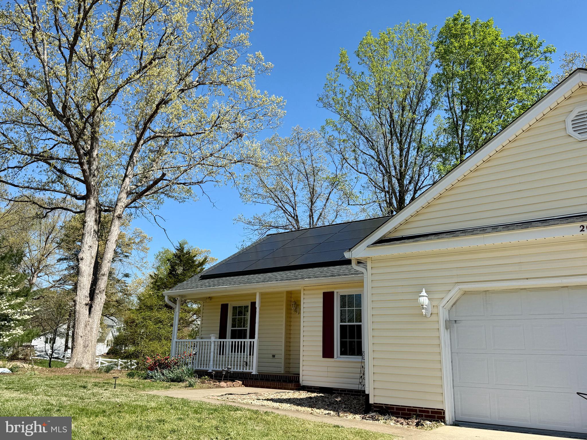 Beautiful Rambler with Solar Power & No HOA – Prime Location!
Welcome to your dream home! This spacious and light-filled rambler is nestled on a beautifully landscaped corner lot in one of the area's most sought-after locations—just minutes from the new VA Clinic, top-rated hospitals, shopping at Southpoint, commuter lots, and the Spotsylvania VRE line for easy access to Northern Virginia and D.C.

Step inside and fall in love with the vaulted ceilings, skylights, and gleaming hardwood floors that create a bright, airy, and welcoming atmosphere. The open-concept living space flows effortlessly into a stylish kitchen featuring granite countertops, newer stainless steel appliances, and abundant cabinet space—perfect for everyday living and entertaining alike.

This home offers a split bedroom floor plan for added privacy, including a serene primary suite complete with a walk-in closet and private en-suite bath. Enjoy peaceful mornings on your covered front porch and host unforgettable gatherings on the expansive back deck overlooking the lush backyard. Need storage? You’ll love the oversized 2-car garage and large outdoor shed.

But the real standout? The Tesla Solar Power System with 12 kW of solar panels and two Tesla Powerwall 2 batteries -27 kWh of backup storage, Tesla Lvl 2 charger—a smart, eco-friendly upgrade that can power your home during outages, reduce energy bills, and increase energy independence. Whether you're looking to support a sustainable lifestyle or simply want the peace of mind that comes with backup power, this system delivers.

The entire Home has been painted ( April 2025),  Trane HVAC (2016), Rheem Hot water (2020)
Roof GAF Timberline HDZ Architectural 30 years (2022), whole house dehumidifier, water softener and reverse osmosis alkaline water system.
 Located just minutes from the new VA Clinic, area hospitals, shopping centers, commuter lots, and the Spotsylvania Virginia Railway Express line, it offers the perfect blend of comfort, style, and accessibility.