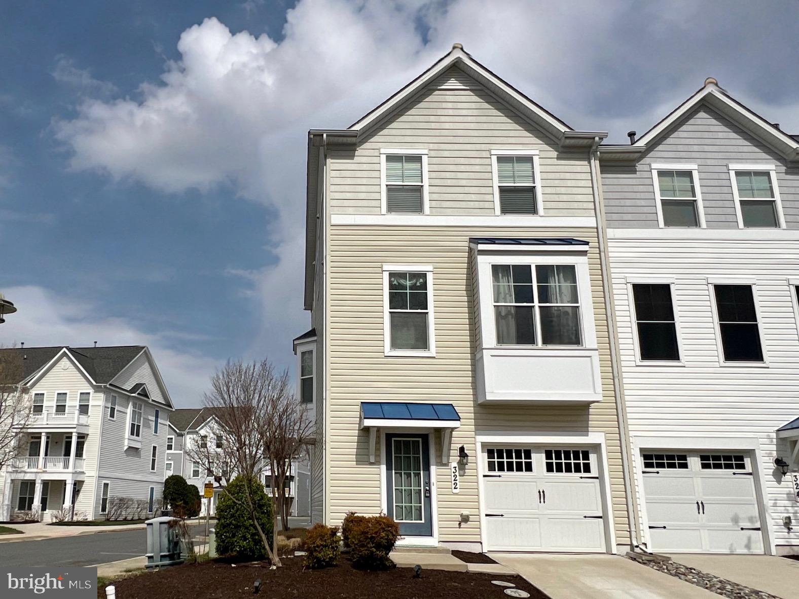 Your Eastern Shore dream home WITH A DEEDED MARINA SLIP awaits and is priced to sell in the gated community of Deep Harbour in historic Cambridge, Maryland! This large end unit located just steps from the community pool complex features over 2,400 sq ft of sunlit living space with high ceilings, custom window treatments, a large owner's suite, and ample free parking across from your private driveway and garage! A BRAND NEW HVAC SYSTEM WAS JUST INSTALLED FEB. 2026 - and this new $15K system includes a 10 year manufacturer warranty! This meticulously maintained former model home is owned by the original owners. The spacious living area on the second level is bathed in sunlight from the many large windows and a bay window bump-out. Ceramic tile flooring lines the sunroom and eat-in kitchen with island, stainless steel appliances, and large pantry. Updated wide plank LVP flooring completes the living room with multiple seating areas for entertaining or relaxing, a half bath and closet for storage. The top floor has 3 bedrooms with recently installed carpet and 2 full bathrooms connected by a hallway with LVP flooring and a linen closet. Decorating options are endless in the owner's suite that includes a sitting area with large windows adorned with custom window treatments including blackout blinds,  a walk-in closet, and a bathroom with double sinks, a soaking tub, and a walk-in shower. Recently installed berber carpet lines the wide stairways leading from the hardwood flooring greeting you at the entry in the foyer. The first floor features a half bath and a den/guest room along with an exercise room/office with slider to the back patio and community pool, as well as the laundry and utility closets, and access to the large garage with storage area and brackets for your paddelboard and bikes.  It's a quick walk or ride to the marina and riverwalk where you have private access to your own deeded boat slip (Slip #3) with association-provided water and electric where you can dock boats up to 33 feet  in length. So in addition to enjoying all of the Deep Harbour community amenities, local Cambridge shops and restaurants, and nearby parks and beaches, you can enjoy boating on the Choptank and Chesapeake from your own slip!  Whether you're looking for a relaxing vacation home, a homebase for coastal adventures from the Bay to the Ocean, or a poolside escape, you'll have ample free time to enjoy it all with no lawn maintenance and security features like an in-house sprinkler system, alarm system , and fire hydrant right out front all within the gated community.  Homes with deeded boat slips aren't often available so visit 322 Shipyard and Slip 3 at the marina today! Monthly water and sewer is a flat rate of $73.20; the $431 association fees represent monthly cost for townhome and $151.00 represent monthly fees for marina slip; see list for additional inclusions; a capital contribution fee may apply; your agent can share information on amenities, HOA/Condo fees, and deferred water/sewer payments from disclosures. All measurements listed are estimated by CubiCasa; buyer and their agent to confirm all measurements, fees, association requirements, tax and school information.