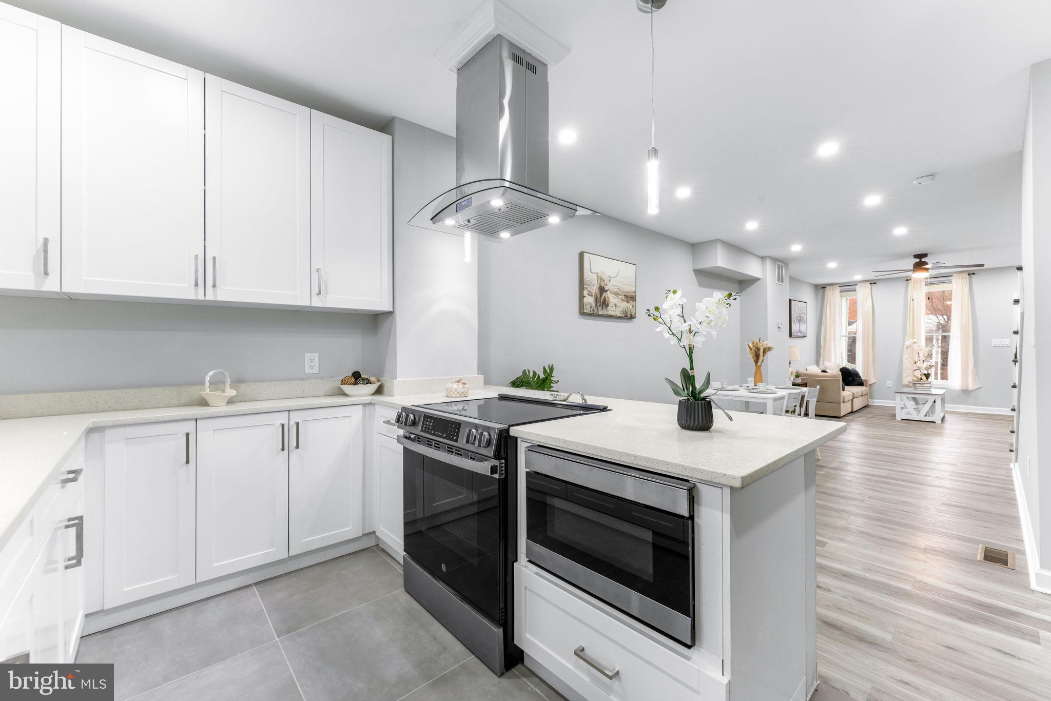 Seller Open to provide buyers assistance!! Every inch of this renovation was pulled with city-approved permits and passed Baltimore City inspections — giving you the confidence of a brand-new home wrapped in the timeless charm of a classic rowhome .Welcome to this beautifully renovated home in the heart of Baltimore’s vibrant Charles Village area, offering the perfect blend of modern upgrades and classic city charm. This move in ready property features 3 spacious bedrooms and 2.5 bathrooms, thoughtfully updated from top to bottom with high quality finishes and attention to detail.
Enjoy relaxing mornings or evening conversations on the inviting front porch, a classic Baltimore feature that adds both charm and additional outdoor living space.
The main level offers a bright, open layout ideal for everyday living and entertaining. The updated kitchen features modern cabinetry, stylish countertops, and stainless steel appliances, flowing seamlessly into the dining and living areas.
Upstairs, you’ll find three comfortable bedrooms including a well appointed primary suite, along with beautifully updated bathrooms designed with both style and functionality in mind.
The fully finished walkout basement provides additional living space perfect for a family room, home office, gym, or guest area, with direct access to the backyard. The basement also features durable epoxy flooring, a high-performance surface known for its moisture resistance, easy maintenance, and long-term durability, making it an ideal choice for lower-level living spaces.
Major improvements include new HVAC, new roof, new windows, and a new water heater, LVP flooring and more. Everything was permitted and inspected by Baltimore city giving buyers peace of mind for years to come.
Located just minutes from the lively Charles Village neighborhood, residents enjoy easy access to local favorites such as the 32nd Street Farmers Market, R. House food hall, and shopping along St. Paul Street and North Charles Street. The home is also conveniently close to Johns Hopkins University, local parks, restaurants, coffee shops, and major commuter routes.
Whether you're a homeowner looking for modern city living or an investor seeking a strong Baltimore location, this property offers exceptional value in one of the city's most desirable and walkable communities.

Schedule your showing today and experience everything this beautifully updated home has to offer.