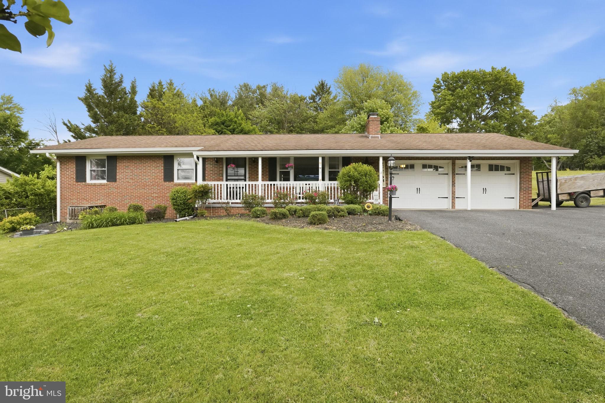 Nestled on a breathtaking half-acre lot with sweeping views of the Catoctin Mountains, this stunning 4 Bedroom, 2 Bathroom single-family home in Frederick offers the perfect blend of charm, comfort, and modern updates. Filled with tons of natural light, the home features beautiful hardwood flooring, recessed lighting, and thoughtfully updated bathrooms throughout. The gorgeous eat-in kitchen is designed to impress with stainless steel appliances, ample cabinetry, and a warm, inviting atmosphere perfect for everyday living and entertaining alike. Cozy up by one of the two fireplaces or unwind on the picturesque front porch while taking in the incredible mountain views. The fully finished basement offers additional living space complete with a bonus room ideal for a home office, gym, or guest area. Outside, enjoy the meticulously maintained backyard with a spacious patio perfect for relaxing or hosting gatherings. Completing the home is an oversized two-car garage and an unbeatable setting that offers peace, privacy, and scenic beauty just minutes from shopping, dining, parks, and commuter routes.