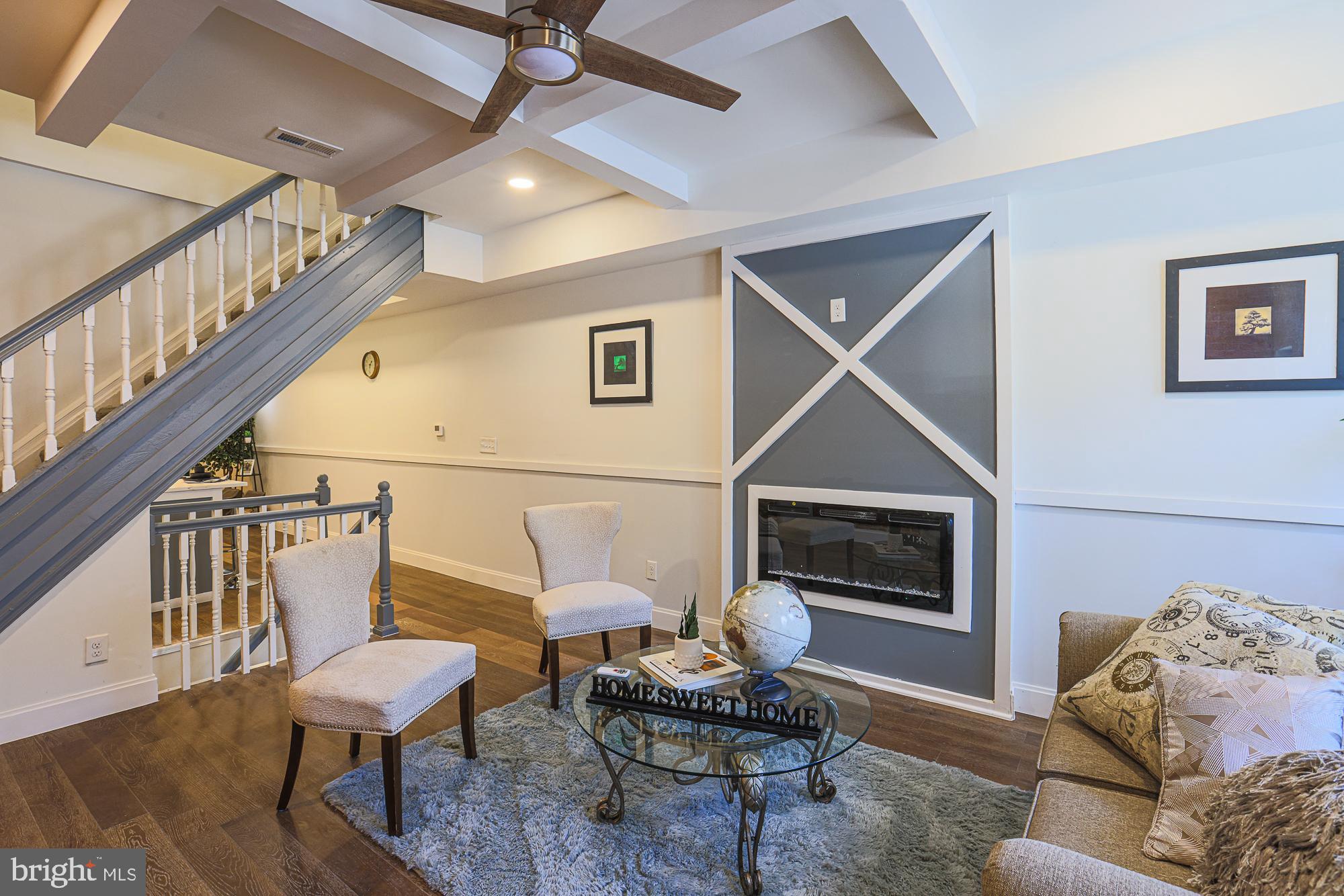 Fully Renovated & Move-In Ready! Welcome to 1909 Mosher St – a beautifully remodeled 3-bedroom, 2.5-bath rowhome offering modern living in the heart of Baltimore. From top to bottom, this home has been thoughtfully updated with stylish finishes and quality craftsmanship. Step into an open-concept main level featuring a blend of hardwood and luxury vinyl plank flooring, a sleek kitchen with stainless steel appliances, quartz countertops, and custom cabinetry with a half bathroom on the main level. Upstairs, you’ll find three spacious bedrooms and one fully updated bathroom with modern fixtures and tilework. The finished basement includes a full bath and a flexible space perfect for a home office, rec room, or guest area. Ideal for homeowners or investors, this property is just minutes from major commuter routes, downtown Baltimore, and local parks. 1750 total sq. ft.