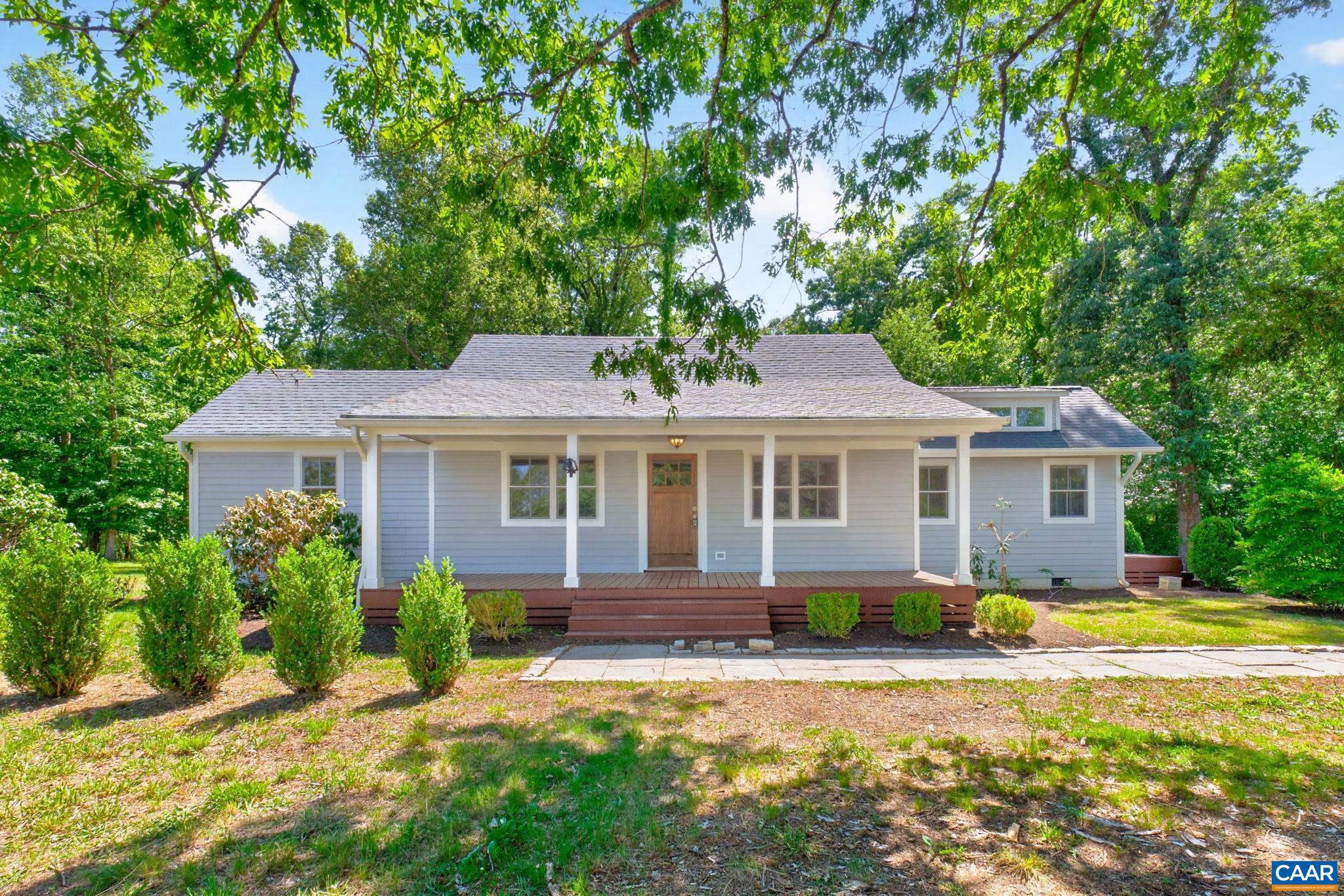 Once part of Hatton Grange, this recently reloved cottage offers a taste of yesteryear and the comforts of today. Featuring original hardwood flooring, an updated primary with attached bath. Updated kitchen, beautiful dining area, mudroom and quiet location. Tons of curb appeal with a generous yard. Old trees stand in the front yard and remind you of when Hatton Ferry rd was dirt and carriages passed to cross on the Ferry.  A piece of history lies on this foundation.  Just a short distance to the James River and Hatton Ferry. Featuring 3 bedrooms including a spectacular primary with en-suite with private deck.  The expansive back deck includes an outdoor shower perfect for those days after floating down the James.  Country living minutes to Scottsville and easy commute to Cville, charm and character awaits the new owner of this country home.