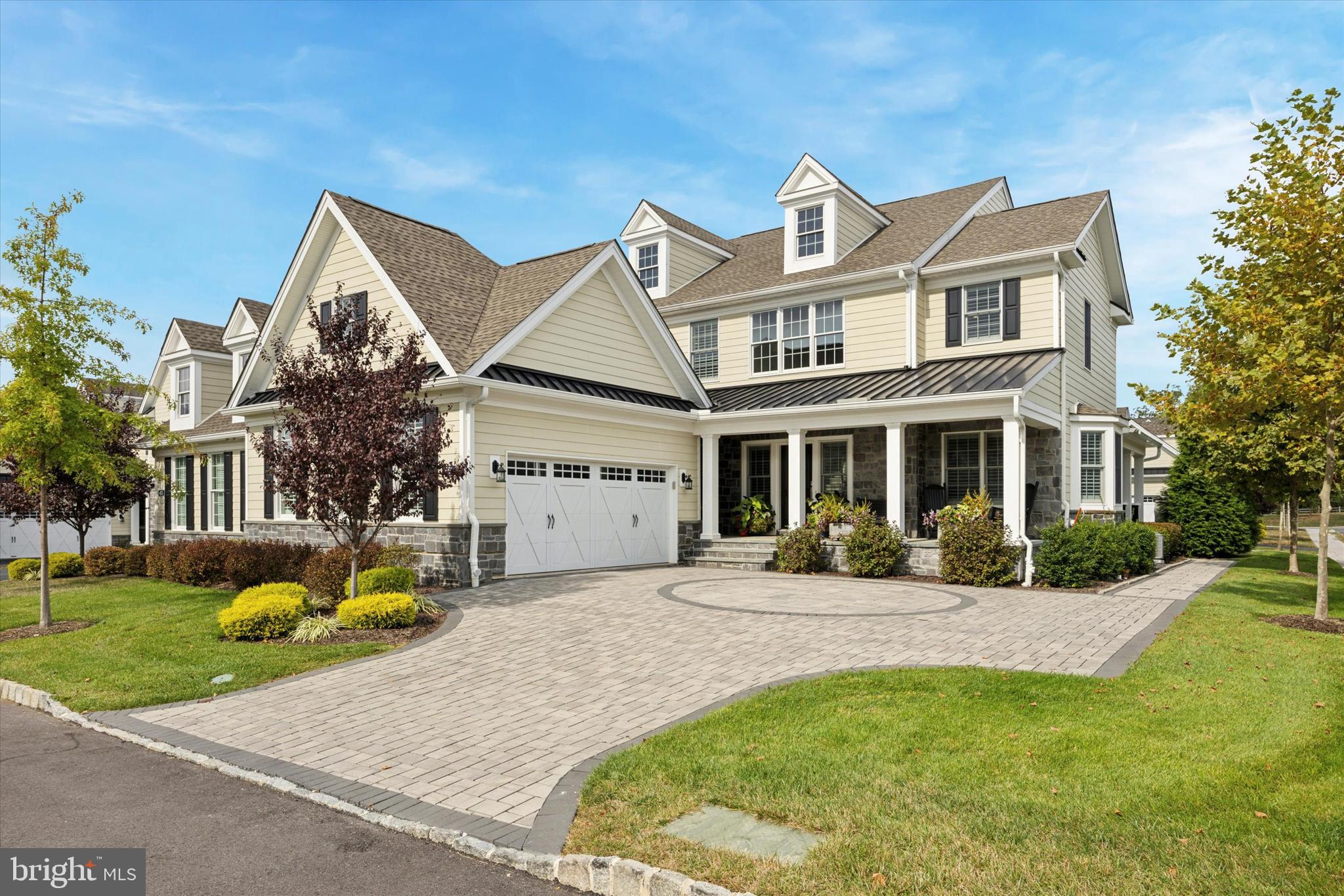 To own 401 Berlo Ln is an aspirational designation of luxury. Make your way up the paver driveway w/ inlet circle design you’re greeted by this 3 BR, 4.1 BA twin home w/ over 5,000 SF. Its colonial architecture was built w/ fiber cement & natural stone siding; illuminated by black Kohler LED lighting & adorned w/ custom landscaping, sodded lawn, underground irrigation system & spectacular outdoor living amenities. An extended flagstone patio welcomes you, inviting you inside to enjoy only the finest of life. A commanding 2-story foyer greets you, w/ a curved oak staircase, soaring triple windows, holiday package electrical upgrade & decadent chandelier. Extending house wide are upgrades like: engineered HWs, custom trim & millwork, highest-end finishes, designer lighting & fans, upgraded plantation shutters on all windows, Closets by Design systems everywhere, Kohler BA fixtures, built-in Sonos speakers in many rooms & more. Among other additions; the rear of the home was expanded during construction; adding a generous 4ft in L. First, notice the bright living room/home office w/ tray ceiling, recessed lights & bay window. Journey into the dining room w/ drop chandelier; conveniently upgraded to feature direct access to the wet-bar/butlers pantry & kitchen. Continue & find the heart of the home; an entertainer’s dream kitchen w/ breakfast room. Marvel at the premium cabinets w/ decorative trim & finishes like: built-in JennAir appliances, Calacatta quartz countertops; pendant, chandelier & recessed lights, large center island & walk-in pantry w/ french door. Delight in the added wet bar & butlers pantry w/ built-in beverage fridge, custom display wine rack & seeded glass upper cabinets. The breakfast room offers bonus space for daily entertaining. Should your hosting lead outdoors, find yourself on the rear deck w/ pergola awning, or extend the evening making use of the custom built gas FP on the bluestone patio. Head back in on colder nights, into the spacious family room where you can enjoy the cozy gas FP. Handpainted wood beams accentuate the ceiling; along w/ recessed lights & fan. From here, a french door leads to another outdoor oasis on the 2nd covered flagstone porch. Conveniently off the family room, are the half BA w/ custom wallpaper. Rounding off the main; is a mudroom w/ built-in bench & bonus side entry. Upstairs & through double doors, find the coveted primary suite w/: a huge custom walk-in closet & shoe closet, coffered ceiling, fan & recessed lights. The spa-like primary BA includes: dual-sink vanity w/ granite top, espresso cabinets, oversized glass enclosed shower w/ bench seating & private water closet. The other 2 BRs offer walk-in closets, recessed lights & fans; each w/ private ensuite. Both BAs have tiled showers w/ glass doors & modern vanities w/ solid surface & Silestone tops. Completing this level is the laundry w/ built-ins & granite laundry sink. Downstairs find a finished basement that’s sure to please. The 4th full BA is here w/ glass door shower, LVP FL & granite vanity. The expansive lower level offers: 9ft ceilings, shiplap accent wall, a bonus garden window & a custom built-in wet bar w/ granite counters & espresso cabinets, center island for 8, designer backsplash, built-in beverage fridge & more. Lastly, the 2-car garage offers custom storage, epoxy FL & EV charging port! Liseter offers a maintenance free living rich w/ amenities like: a Carriage Barn & Clubhouse, exercise & game rooms, multiple sporting courts, walking paths, USPS & more. This peaceful community is min from all the best Newtown Sq has to offer. Pop over to the Village at Ellis Preserve for shops & restaurants. Join Aronimink Golf Club, one of many prestigious local country clubs, & enjoy a round of golf or connect w/ others. You'll be located in Marple Newtown SD w/ only the best universities & private academies nearby such as Episcopal & Malvern Prep.  401 Berlo has everything you're looking for! Schedule today!
