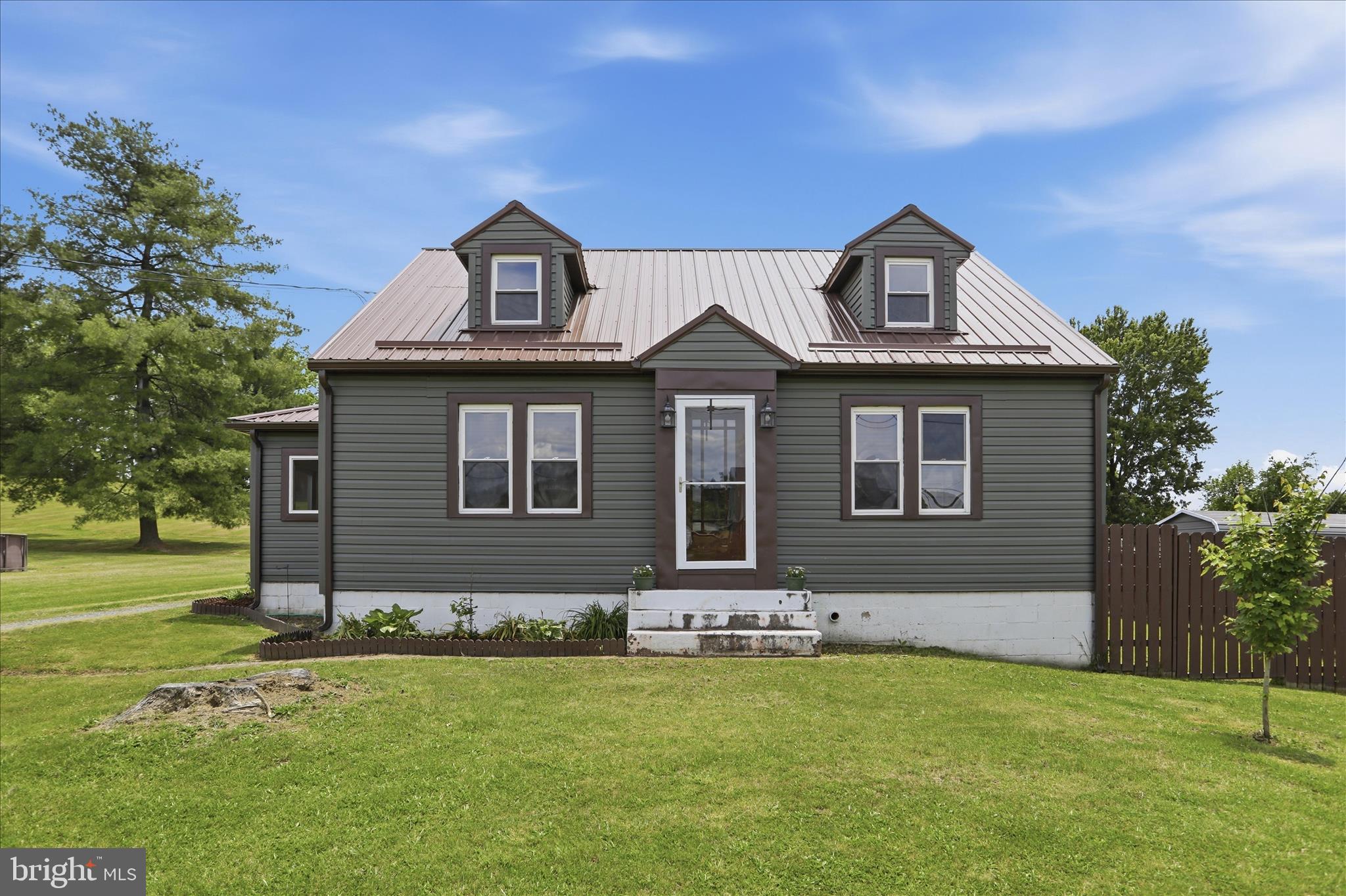 This charming and well maintained home combines classic character with modern updates. Inside, you’ll find an updated kitchen, spacious living areas, and a bright sunroom perfect for morning coffee or evening relaxation. Outside, the property features a detached two-car garage, metal roof, and easy-to-maintain yard. Conveniently located just minutes from Fort Ashby and Cumberland, this move-in-ready home offers comfort, functionality, and small-town charm.