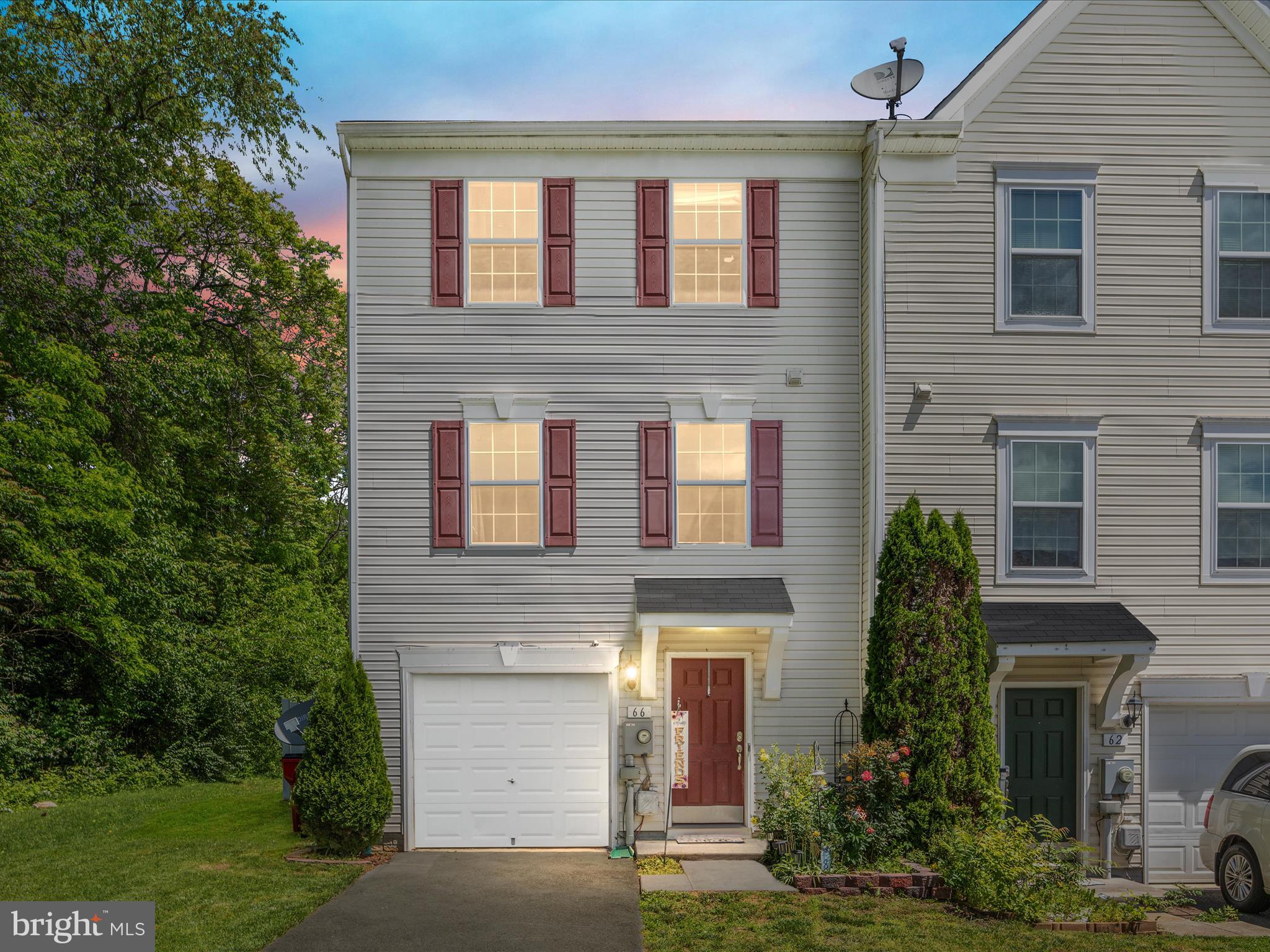 This spacious End Unit, 3-story townhome features a 1 car garage, 3 bedrooms, 2 full bathrooms and 2 half baths, offering over 2,200 total finished square footage of comfortable living space.  Additionally, the home includes a 12 x 16 composite deck, paver patio below, and vinyl privacy fencing which completes the outdoor entertaining space. The kitchen boasts a center island, stainless steel appliances, with ample cabinet space and luxury vinyl plank flooring on the entire main level. The morning room off of the kitchen along with the family room are perfect for relaxing or entertaining friends. Upstairs, the primary suite features enough space for a king-sized bed, a walk-in closet, along with a lovely bathroom with a soaking tub and separate shower. Two more adequately sized bedrooms and a second full bath complete the upper level.   Conveniently located in Hedgesville, this home offers easy access to local amenities, parks and recreation, and commuter routes, ensuring a lifestyle of comfort and convenience.  Schedule a showing today!