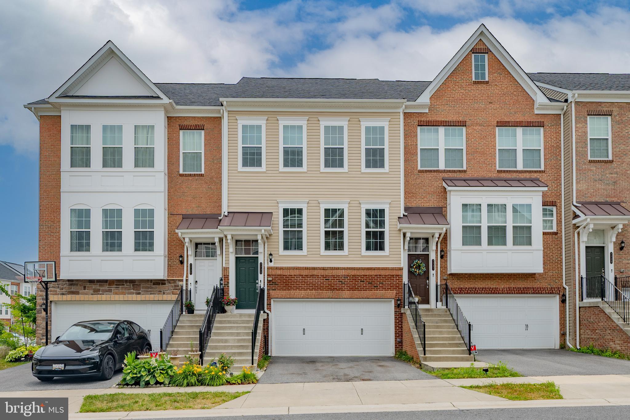 This home is a beautifully crafted 3-level Interior Row Townhouse built in 2020 by Pulte Homes. Offering modern elegance and thoughtful design, this home features:
• 3 spacious bedrooms and 2.5 baths, ideal for comfortable living.
• A fully finished basement, perfect for a home office, or additional living space.
• Hardwood floors, paired with granite countertops and stainless steel appliances, elevating the home’s interior appeal.
• A bright, open-concept kitchen and dining area, complete with a large island and ample natural light from numerous windows.
• A luxurious primary suite with an ensuite bathroom, boasting a soaking tub and a separate shower for ultimate relaxation.
• Outdoor living areas, including a covered patio and a deck, perfect for entertaining or unwinding.
• A 2-car attached garage, providing convenience and security.
Community Features:
The Property is situated in a vibrant community brimming with amenities, including:
• A clubhouse designed for gatherings, featuring a gas fireplace, open kitchen, and plenty of seating.
• A connected fitness center and access to a large community pool with distinct areas for lap swimming and children, plus gas barbecues and shaded seating.
• Multiple tot lot playgrounds, offering delightful spaces for children to play.