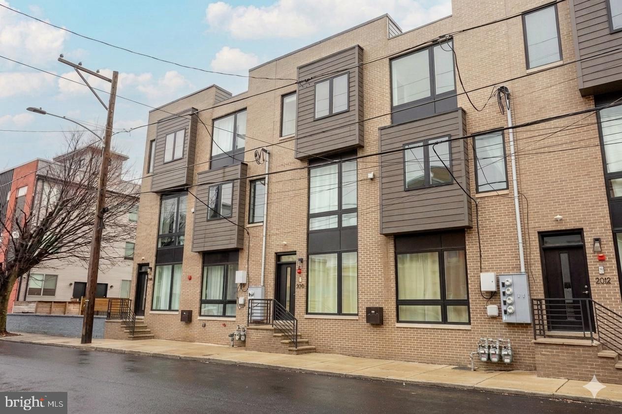Welcome to 2010 N 5th Street, a 2-bedroom, 1-bath condo in Philadelphia. As you enter the home, you’re greeted by the kitchen featuring hardwood floors, quartz countertops, a center island with bar seating, and stainless steel appliances. The kitchen flows into the living room, which also offers hardwood flooring, creating a comfortable space for everyday living. Both bedrooms feature hardwood floors and provide flexible space for a primary bedroom, guests, or a home office. The full bathroom includes tile flooring and a tub/shower combination. An in-unit washer and dryer add to the home’s convenience. Ideally located near local shopping, grocery stores, restaurants, and more, this condo also offers approximately six years remaining on the tax abatement. Don’t miss the opportunity to make 2010 N 5th Street your new home.