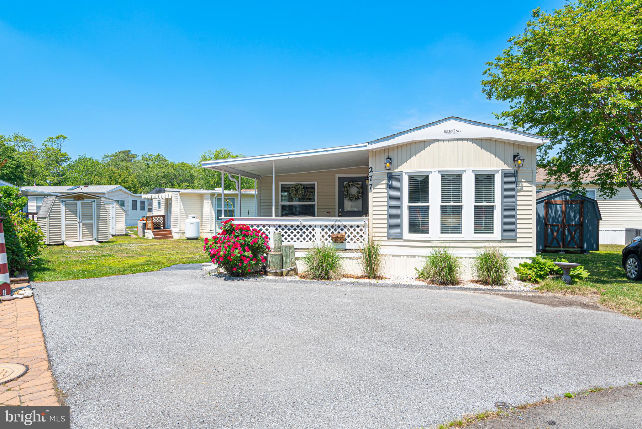 White Horse Park is one of the area’s hidden gems, located just off the St. Martin River and only 6 miles from Ocean City. This charming 2-bedroom, 1-bath coastal getaway is the perfect beach retreat.

You’ll love the vintage touches throughout, including the nostalgic wallpaper and the hard-to-find built-in bunk beds that add both character and functionality. There’s plenty of room for everyone thanks to the oversized living room, which can also serve as a bonus sleeping area for guests.

Recent updates include an updated roof, heat pump, paved driveway, and vinyl windows throughout. The property also features one of the nicest yards in the community, offering the feel of a double lot with plenty of outdoor space to enjoy.

The covered front porch is the perfect place to sip your morning coffee or unwind after a long day of boating, beach trips, or waterfront fun. This turnkey property is fully furnished and ready to enjoy—just bring your suitcase! Even the barbecue grill is waiting for you in the shed.

White Horse Park amenities include access to the marina, swimming pool, kayak and canoe racks, clubhouse, playground, picnic areas, community grills, and more. Boat slips and boat storage are also available.

Don’t miss your chance to own this affordable coastal escape close to everything Ocean City has to offer!