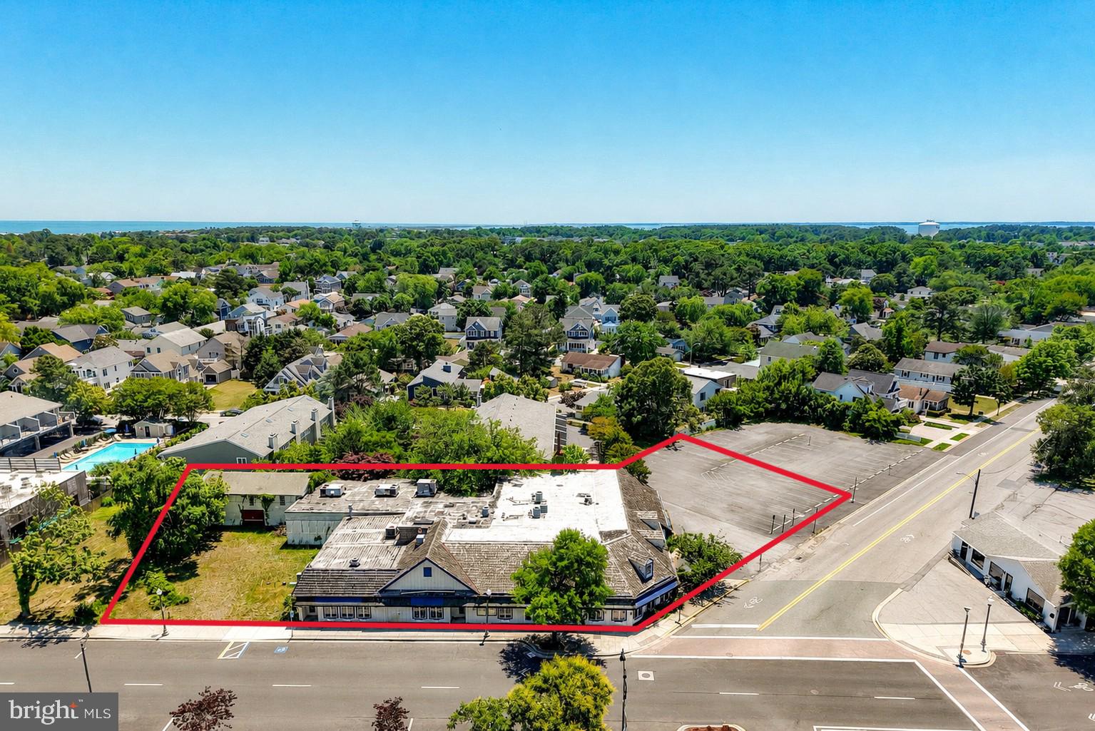 REHOBOTH AVENUE MEETS POSSIBILITY.  A rare opportunity to acquire one of downtown Rehoboth Beach’s most prominent redevelopment sites. Positioned at the highly visible corner of Rehoboth Avenue and State Road, just four blocks from the iconic Rehoboth Beach Boardwalk, this nearly three-quarter-acre parcel sits at the center of one of the East Coast’s most desirable coastal destinations.The primary parcel consists of 0.53 acres of C-1 Commercial-zoned land with substantial frontage along Rehoboth Avenue, offering exceptional visibility and accessibility. A secondary 0.20-acre parcel zoned R-1 Residential provides valuable off-street parking, enhancing the development potential of the site. Whether your vision is a boutique hotel, destination restaurant, mixed-use development, retail center or an entirely unique concept, this property offers the scale, location, and flexibility to bring it to life. For purchasers seeking an even larger footprint, two adjacent residential lots, each slightly larger than 50’ x 100’ are available separately ($1.250M each) creating additional possibilities for expansion and future development. All existing improvements convey in as-is condition. Renovation, repurposing, or removal of the existing structures shall be the responsibility of the purchaser.  Opportunities of this size and prominence in downtown Rehoboth Beach are exceptionally rare.
