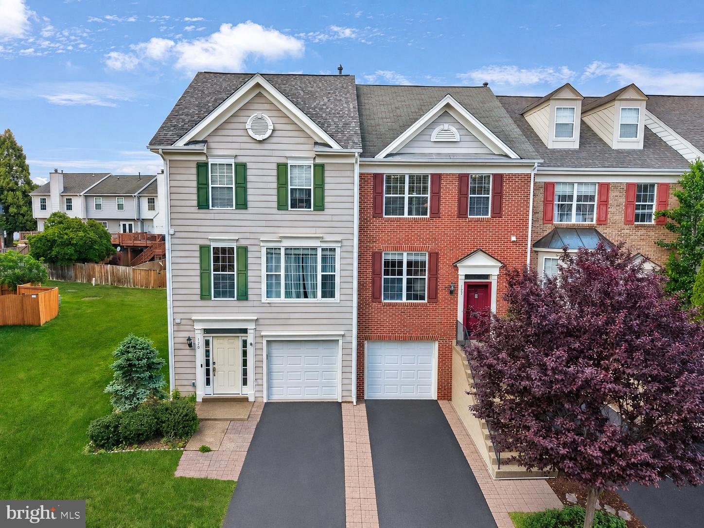 Nestled within one of Leesburg's most welcoming and amenity-rich communities, this beautifully updated townhome offers the perfect blend of comfort, style, and convenience. Ideally situated backing to a serene common area, the home enjoys a rare sense of privacy with no residences directly behind or in front, creating an open and tranquil setting.

Thoughtfully enhanced throughout all three finished levels, the residence showcases modern luxury vinyl plank flooring installed between 2023 and 2025, delivering a cohesive and contemporary aesthetic. The refreshed kitchen features additional cabinetry added in 2023, providing both enhanced functionality and storage, while the laundry area was similarly upgraded with custom storage solutions.

The versatile lower level was reimagined in 2020 with the addition of a fourth bedroom and full bath, offering exceptional flexibility for guests, a private home office, or multigenerational living. Outdoor living is equally inviting, with an updated deck and newly added stairs (2024) overlooking the peaceful green space beyond.

Residents will appreciate the convenience of a private driveway, additional parking directly across the street, and easy access to neighborhood amenities. The sellers especially value the quiet setting, nearby pocket park, and extensive network of walking trails connecting to the community pool, tennis courts, and recreational spaces.

Significant capital improvements provide added peace of mind, including a new HVAC system (2024), water heater (2022), and updated water shut-off valves for both front and rear exterior bibs (2022).

Perfectly positioned just minutes from the Greenway, Route 7, and Route 15, this exceptional home offers effortless access to Leesburg's vibrant dining, shopping, entertainment, and commuter routes while maintaining the charm and tranquility of neighborhood living.