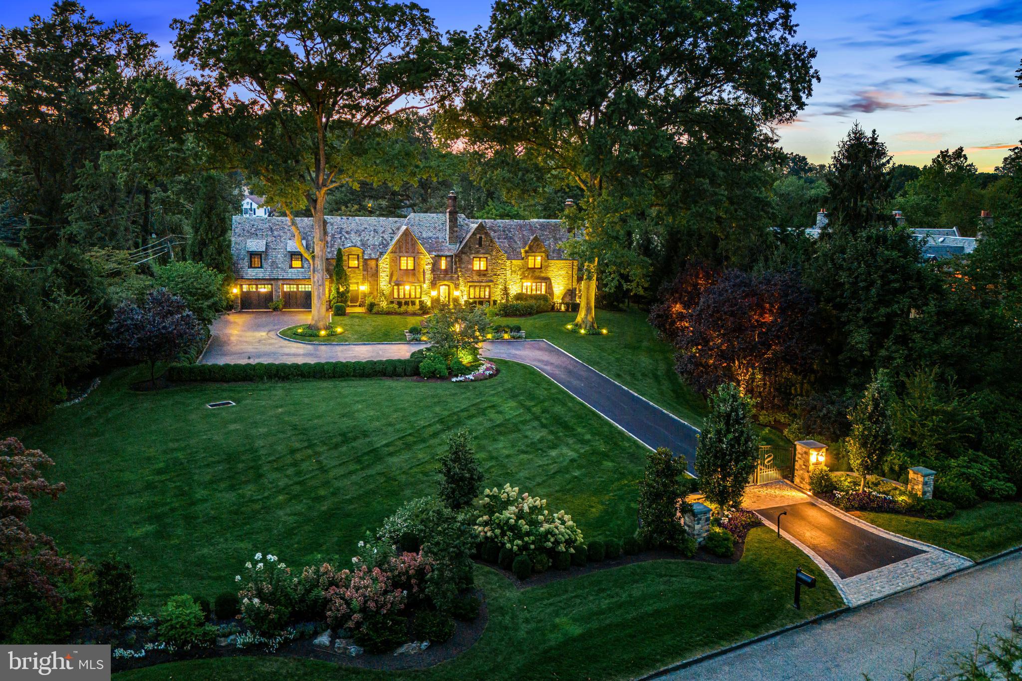 Welcome to this breathtaking 1930's residence set in the coveted Merion Golf neighborhood. It offers sophisticated renovations throughout, beautiful materials and craftsmanship and light-filled designs at every turn. The spectacular grounds with stunning pool, spa, terraces, specimen plantings and private, gated grounds create an unparalleled setting within this renowned walking neighborhood. Look no further and enjoy the gracious room sizes with a wonderful open floor plan, perfect for comfortable everyday living and easy indoor/ outdoor entertaining an both small and large scales with room for an elevator.  Stunning features include original restored architectural features, millwork, moldings and plaster walls, new systems, wiring, plumbing and fixtures, incredible expanded gourmet kitchen with expansive island, chef's appliances and fireplace, butler's pantry with extensive custom wine storage, spectacular family room with soaring ceiling, adjacent sunroom with wet bar, 5 spacious bedroom suites including a luxurious primary suite with marble bathroom and two walk-in closets, and a cozy lower level with media room, gym area, wine/ game room, bathroom and plentiful storage. Close to world class schools and Universities, trains, fabulous shopping, farmers markets, all forms of transportation, Merion Golf and Cricket Clubs, endless recreational venues, sports complexes and more. Absolute perfection!!